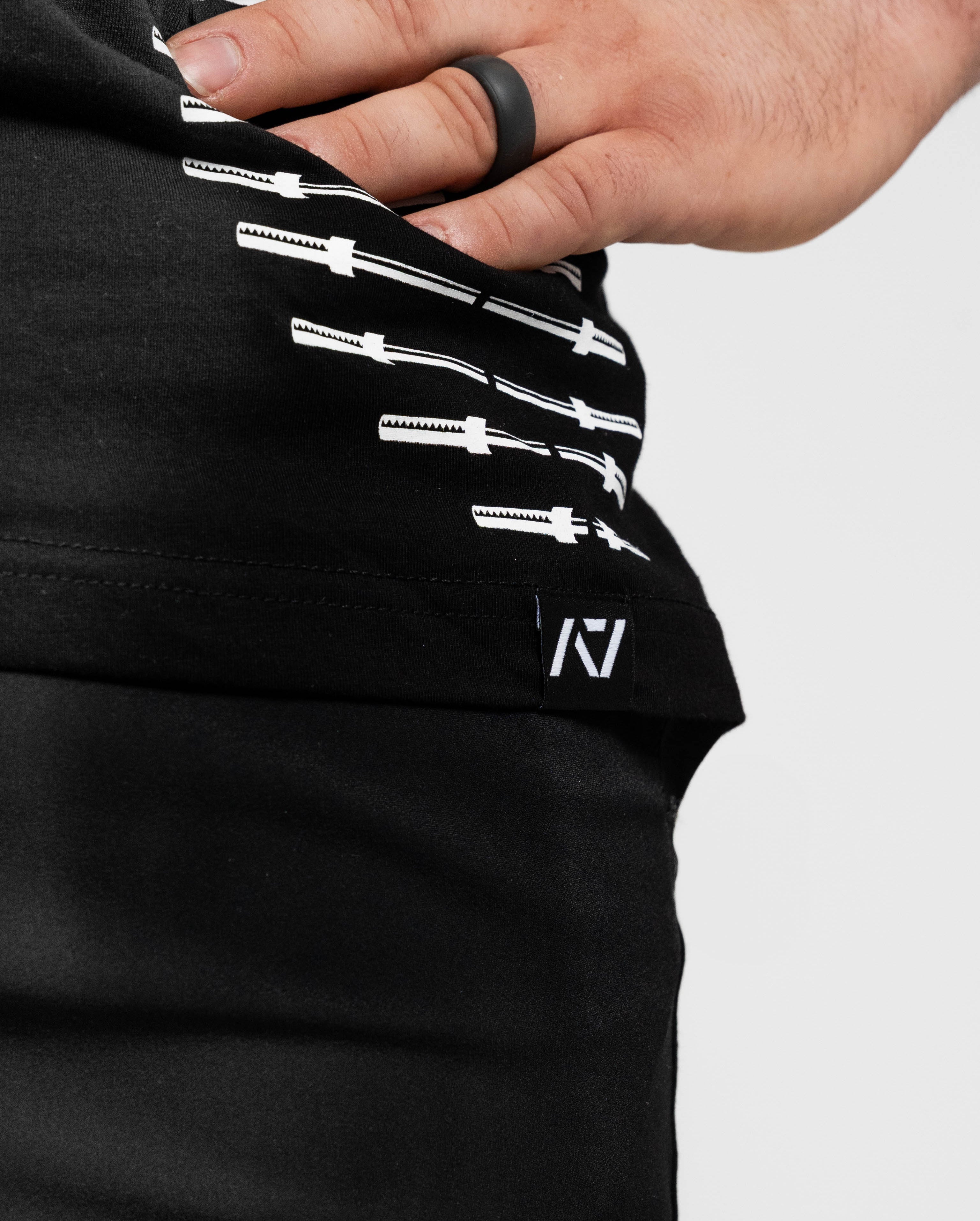 Hem tag with A7 logo on barbell DNA men's bar grip shirt