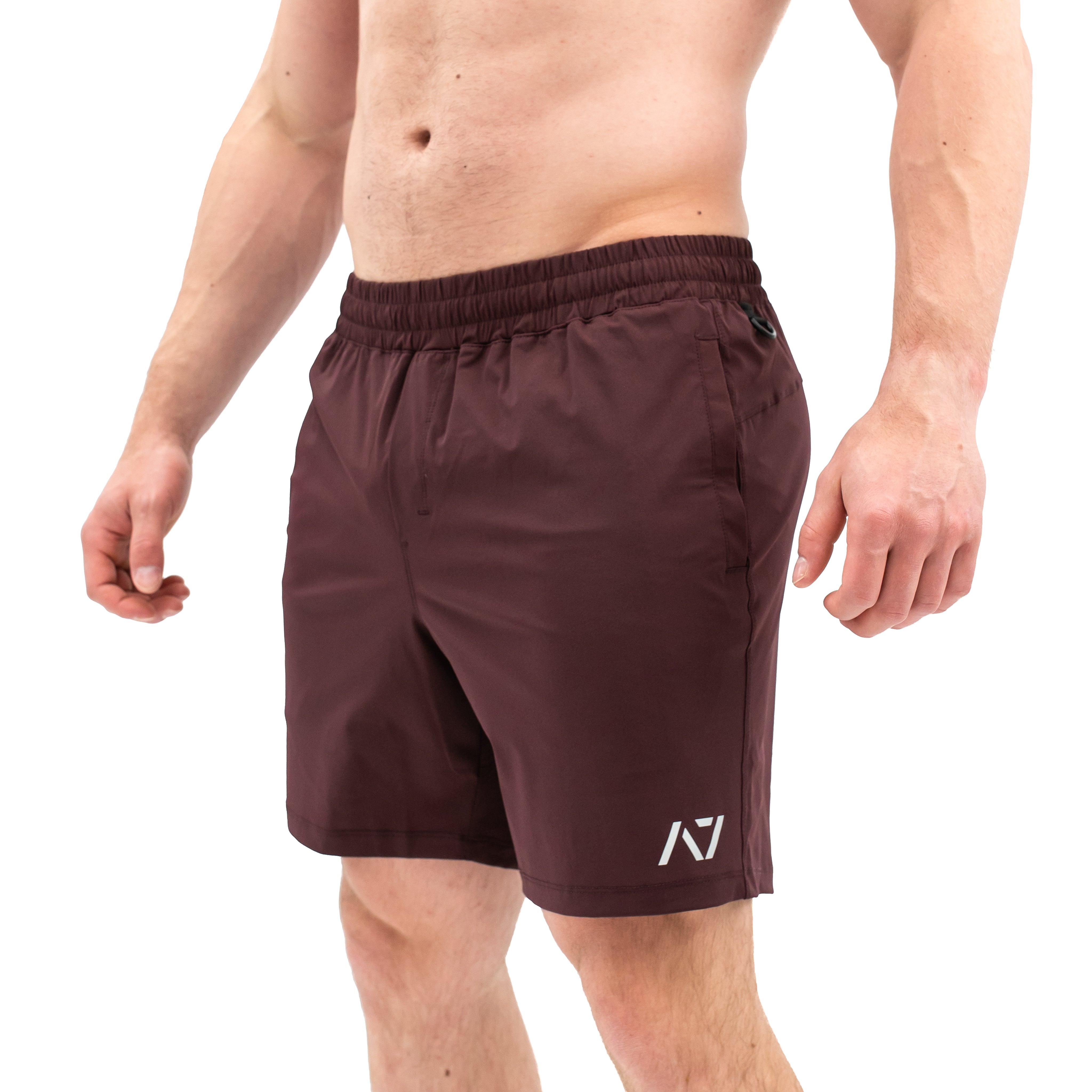 Side profile of Mahogany 360Go Regular Shorts showing extended inseam and 360° stretch for full mobility.