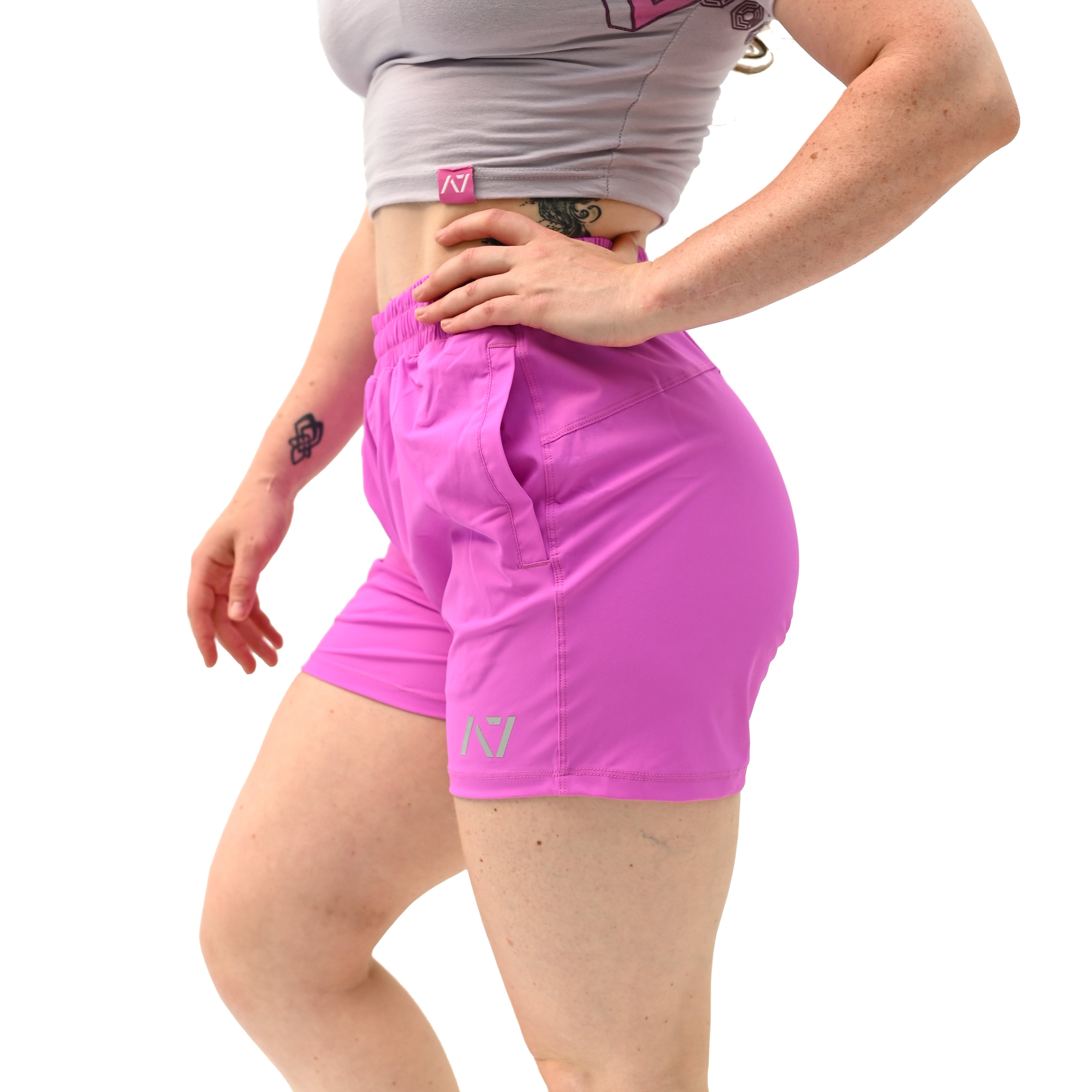 Side profile of Orchid 360Go Shorts showing extended inseam and flexible stretch fabric for unrestricted movement.