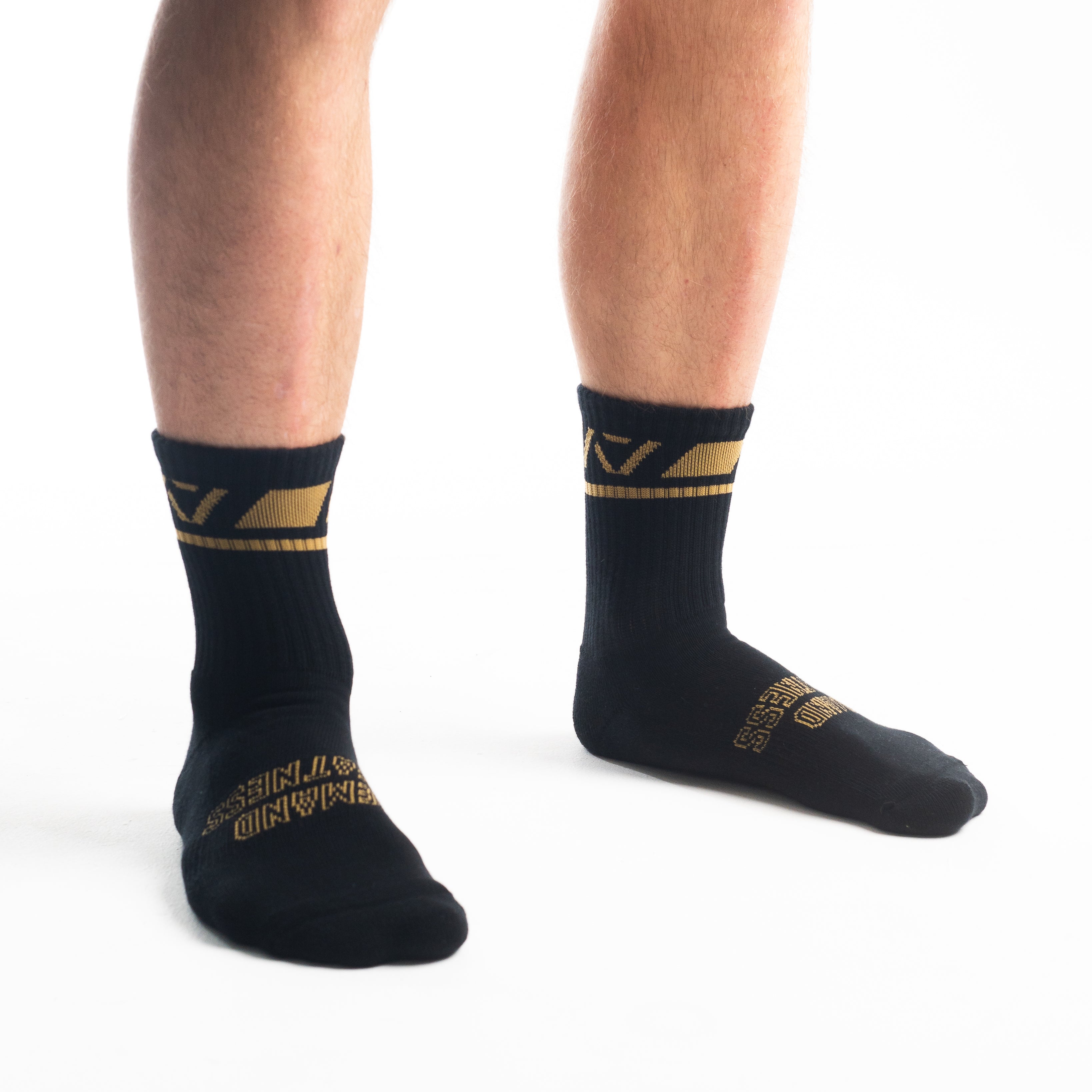 Side profile of A7 Crew Socks in Gold Standard, highlighting the A7 logo on the ankle and compression-style top.