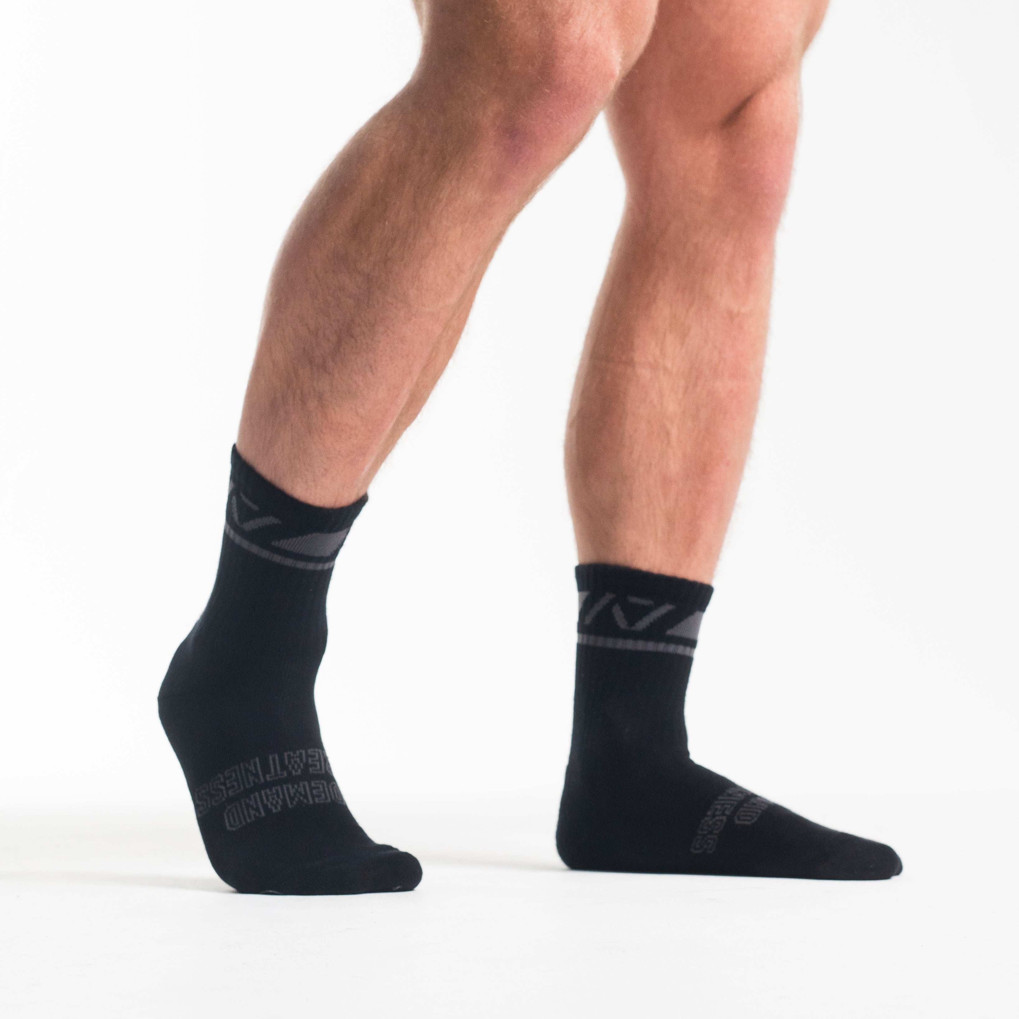 Side profile of A7 Crew Socks in Shadow Stone, highlighting the A7 logo on the ankle and compression-style top.