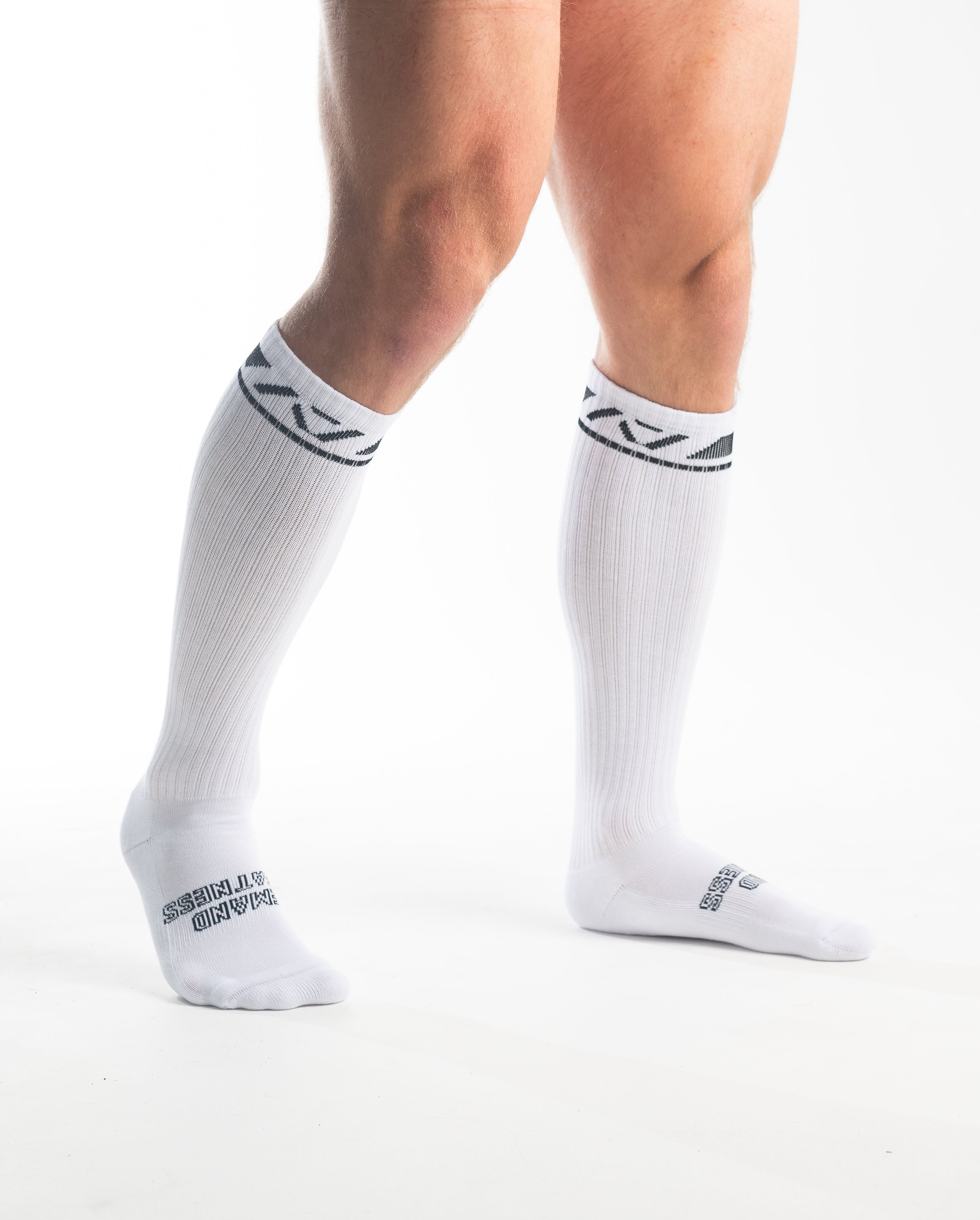 Side profile of A7 Deadlift Socks in Domino White, highlighting the A7 logo on the ankle and compression-style top.