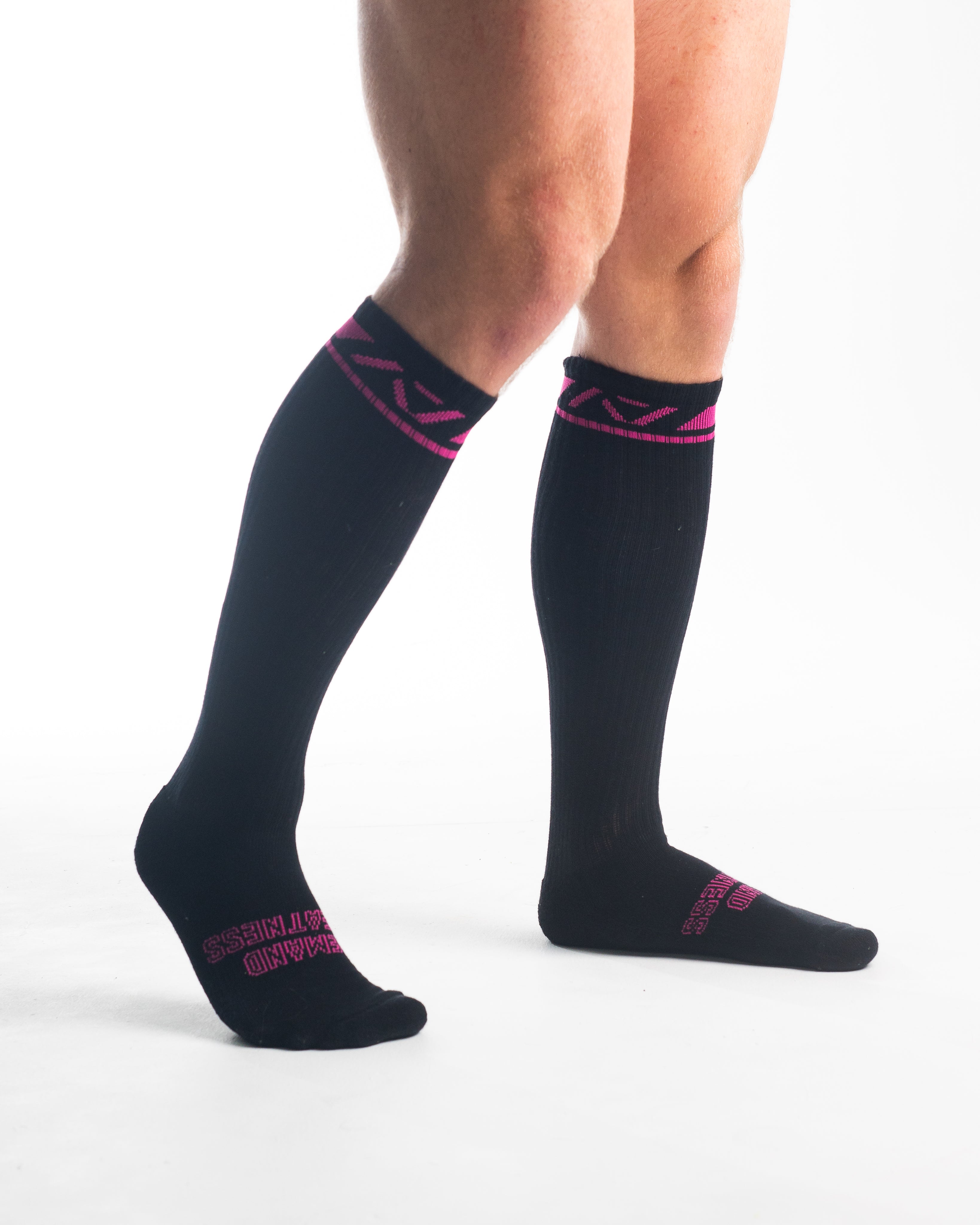 Side profile of A7 Deadlift Socks in Flamingo, highlighting the A7 logo on the ankle and compression-style top.