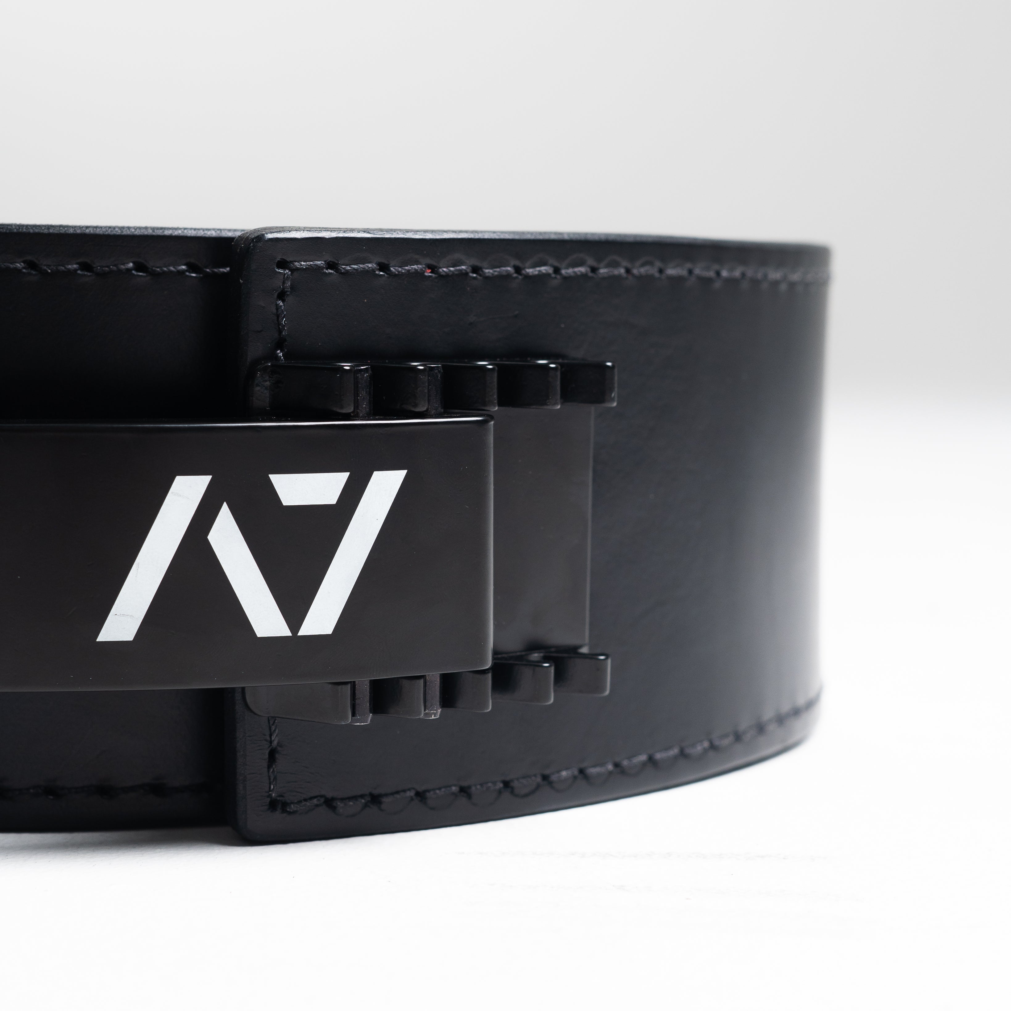 A7 PAL Buckle mounted on a leather lifting belt, showcasing fit and adjustable tension capability.