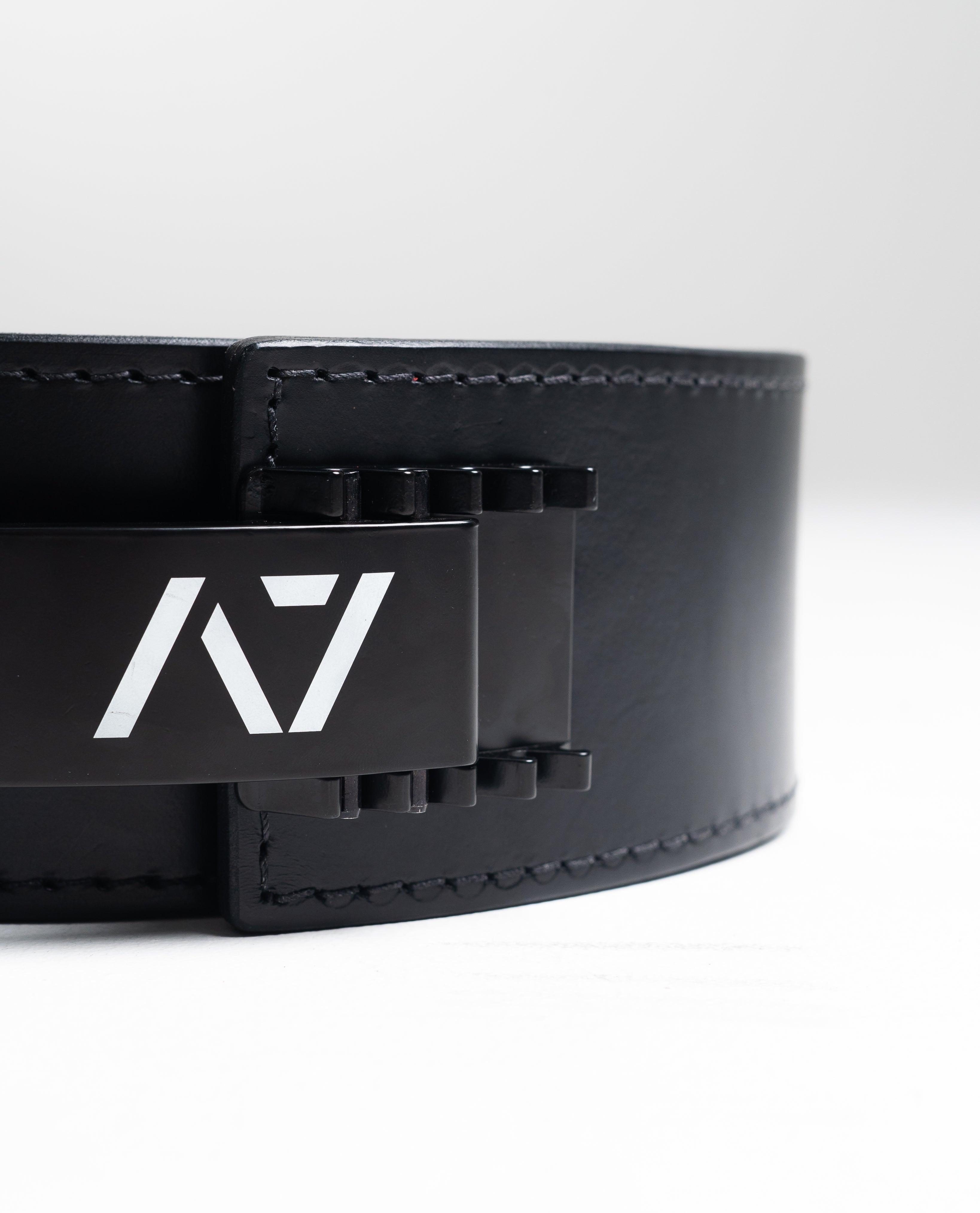 A7 PAL Buckle mounted on a leather lifting belt, showcasing fit and adjustable tension capability.