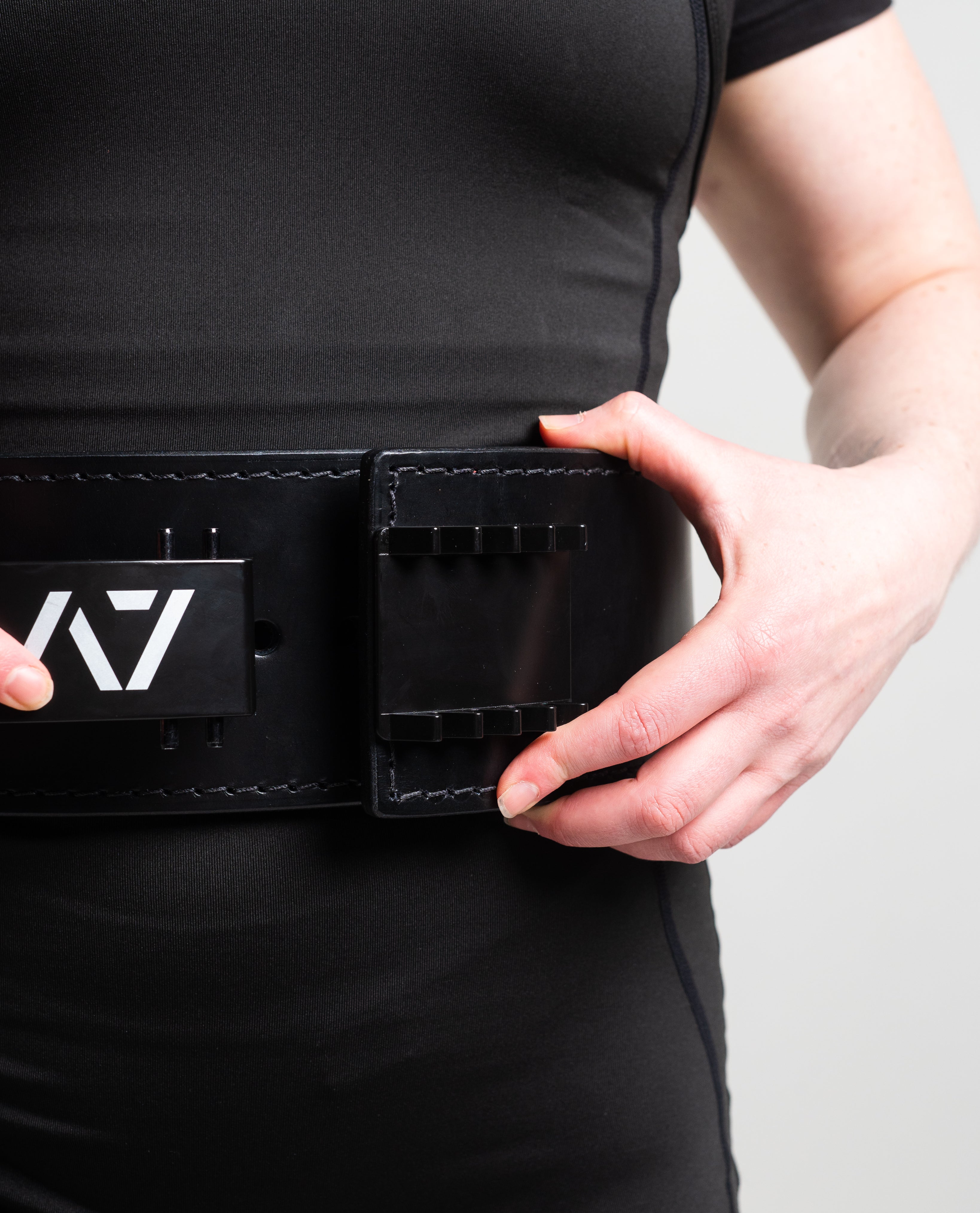 Showcasing A7 Pal Buckle on belt, on lifter.