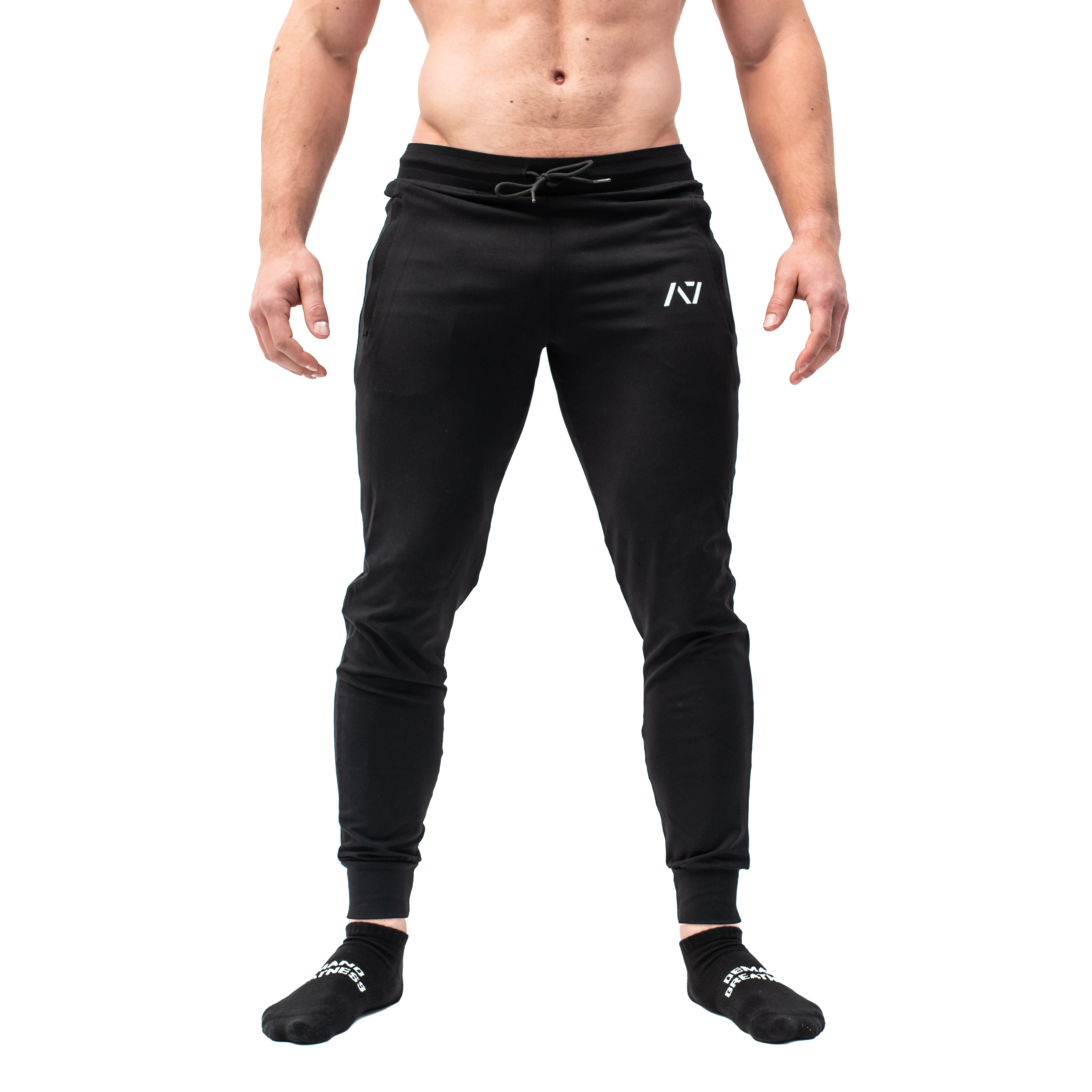 Front view of A7 Defy Joggers – Black with tapered leg, mid-rise waist, and zipper pockets.