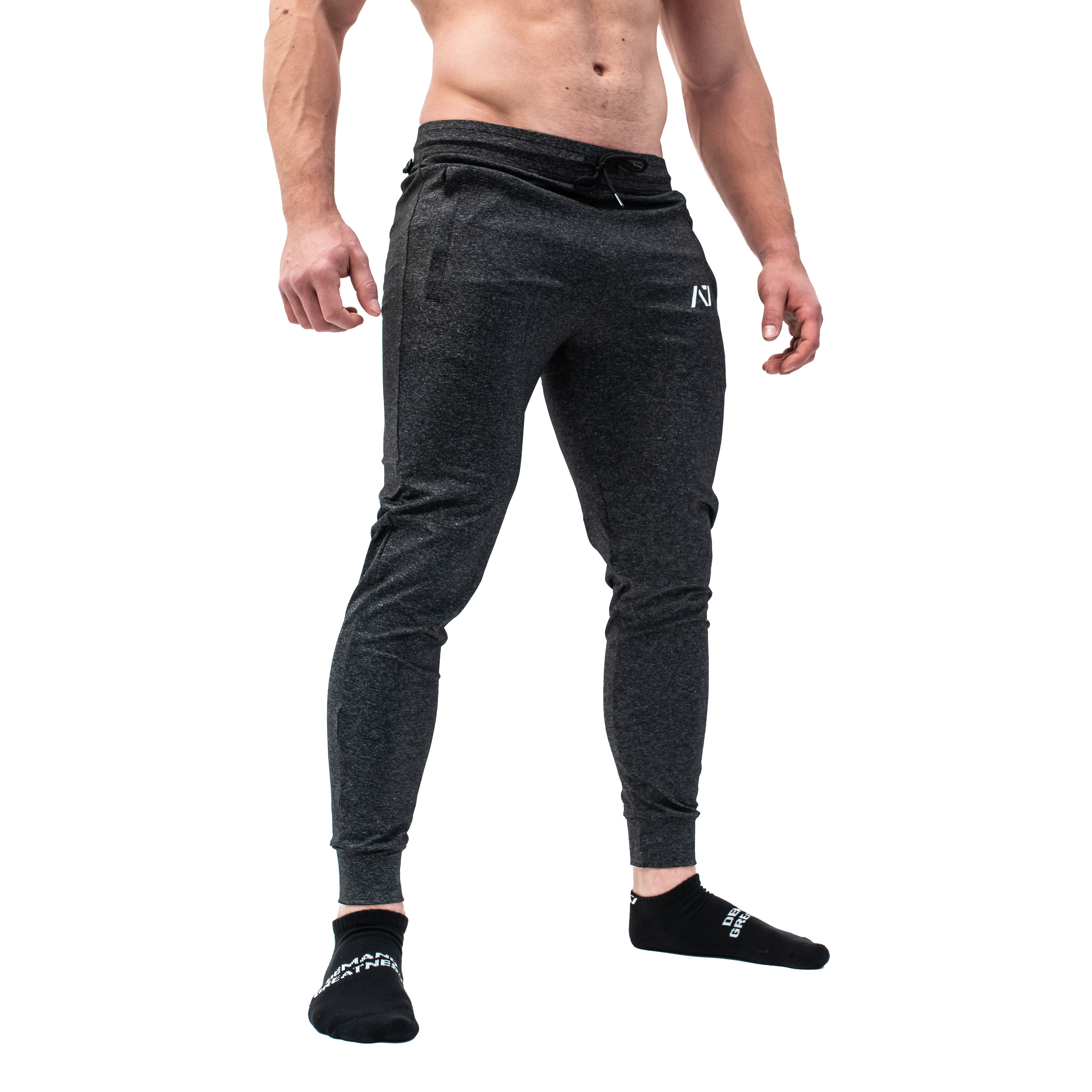 Side profile of A7 Defy Joggers – Charcoal showing elastic cuff and integrated key clip for fixture.