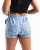 Rear view of A7 Slate Blue powerlifting shorts with ripstop loop-through pockets and contoured athletic cut.