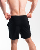 Rear view of 360Go 1Z Shorts in Stealth with ripstop loop-through pockets and clean black-on-black styling.