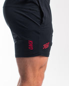 Matte silicone A7 logos on Accelerant Pink 360Go KWD Shorts for subtle branding and a clean finish.