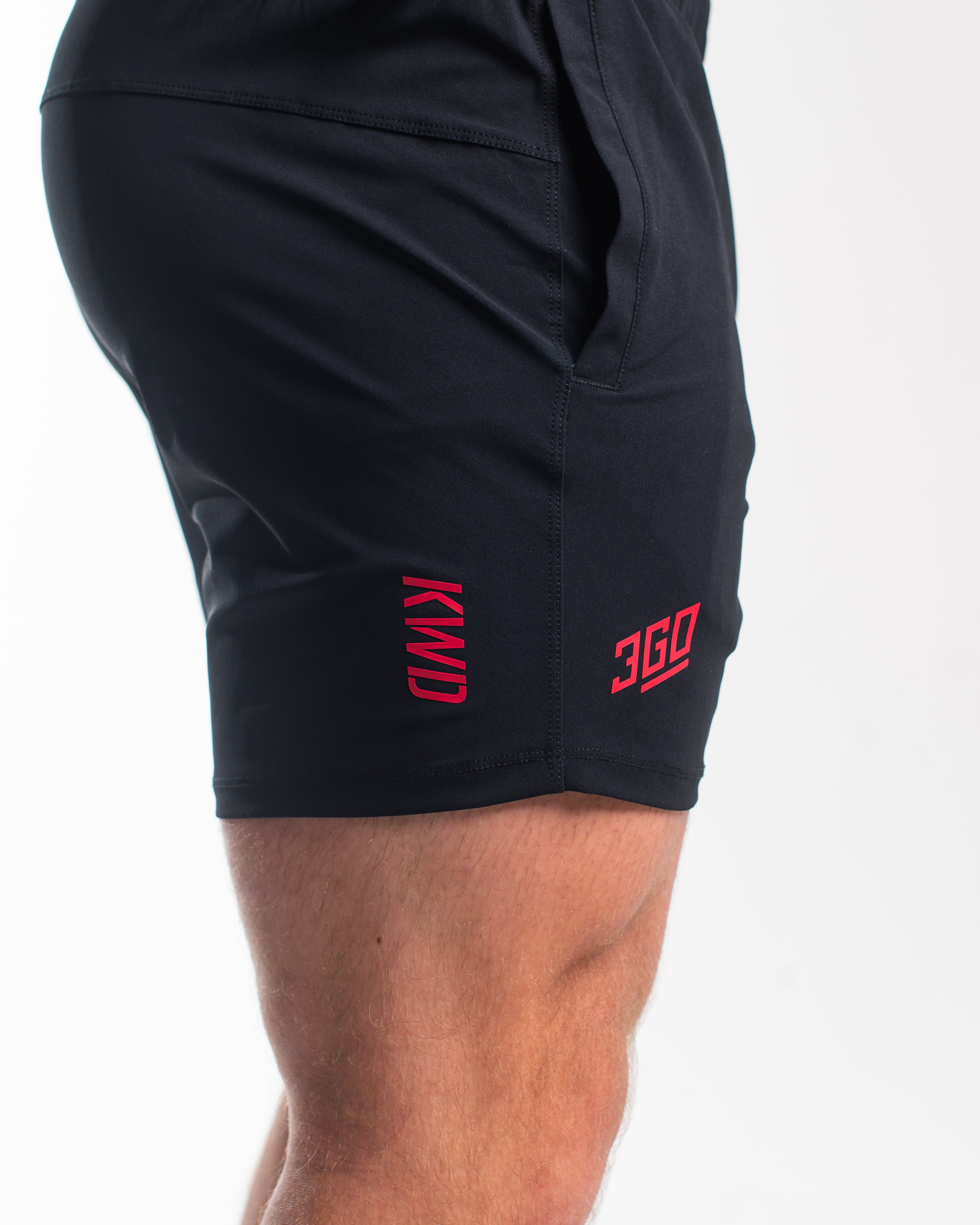 Matte silicone A7 logos on Accelerant Pink 360Go KWD Shorts for subtle branding and a clean finish.