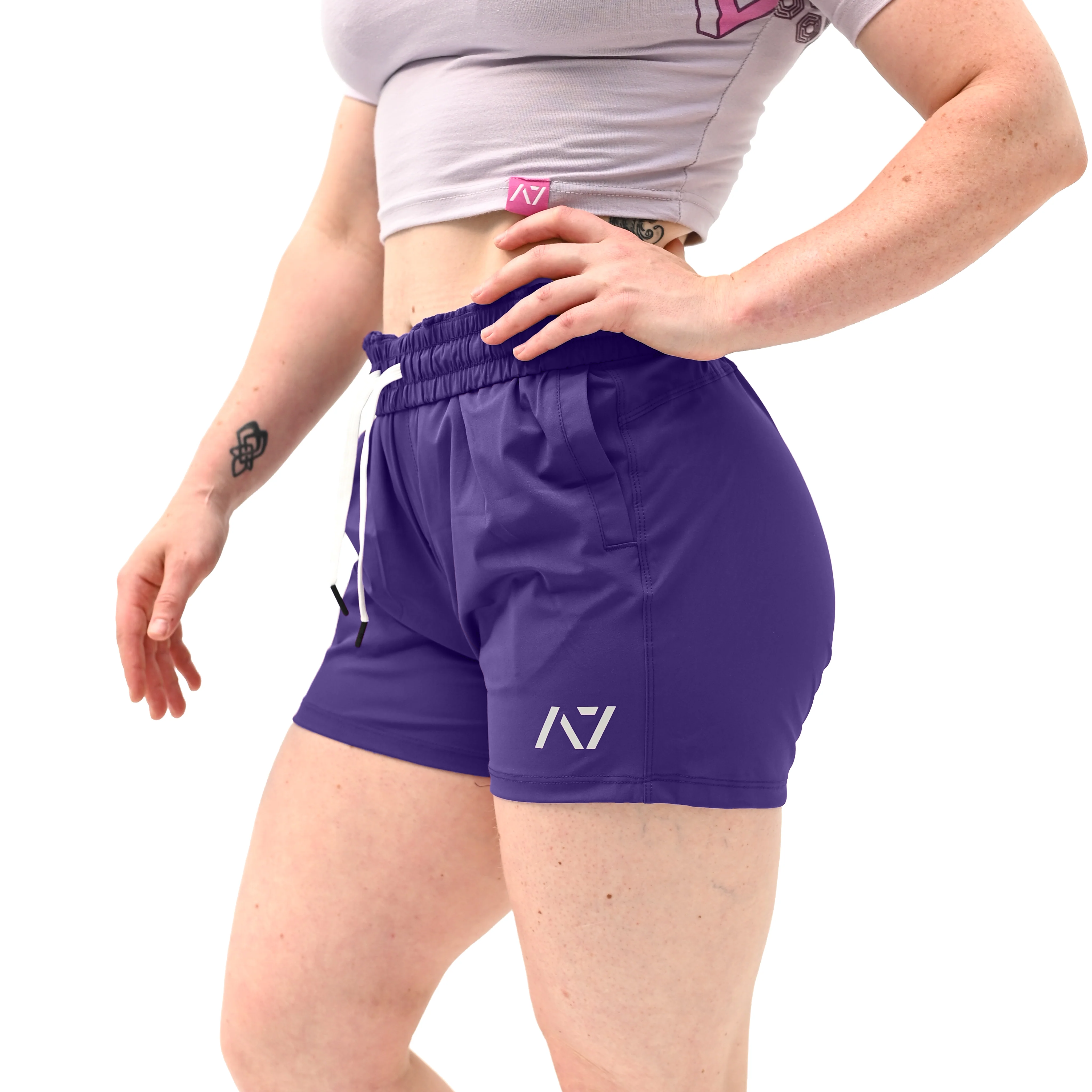 Side profile of Purple 360Go KWD Shorts showcasing short inseam and 360° stretch construction for mobility.

