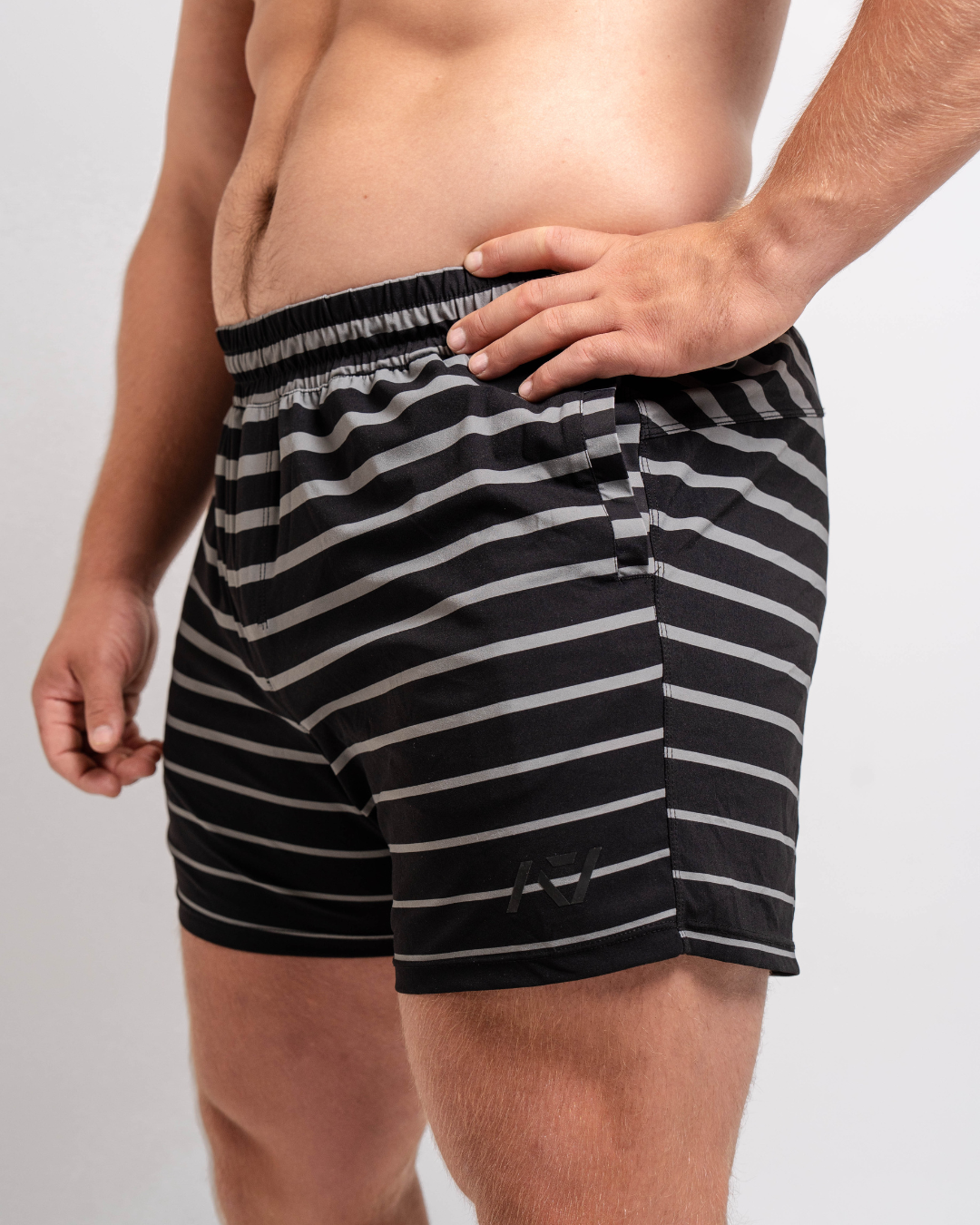 Front view of A7 360Go KWD Shorts in Shadow, featuring minimalist design, wide waistband, and athletic performance fit.