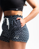 Side profile of Stelacrosha Black 360Go KWD Shorts showcasing short inseam and performance fit for mobility.