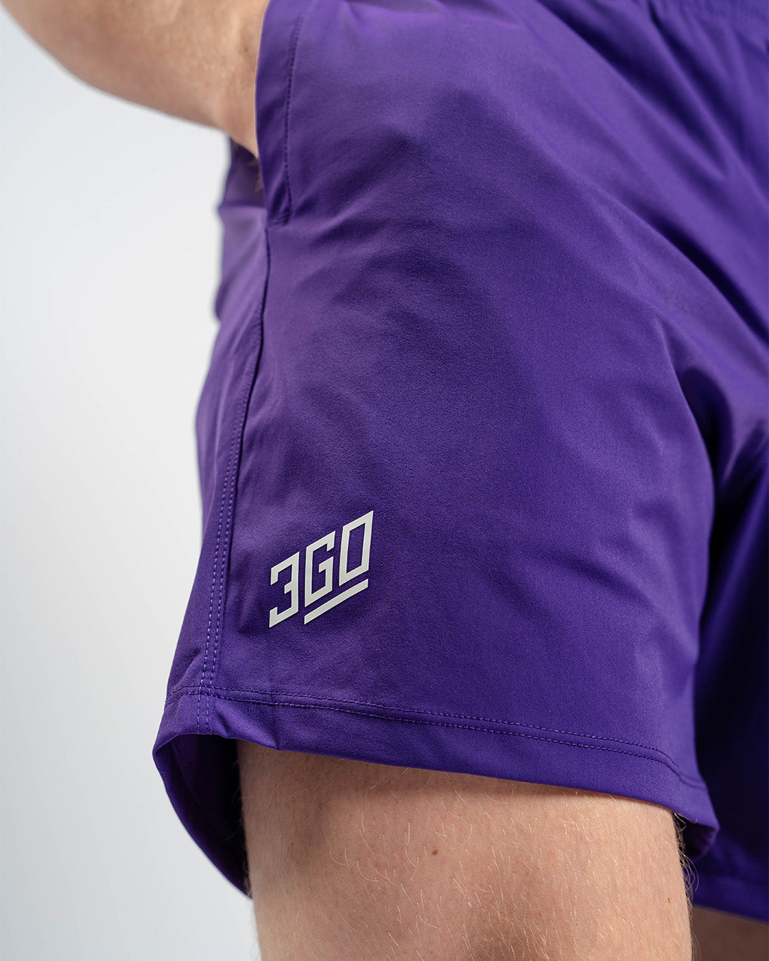 Matte silicone A7 logos on Purple 360Go Shorts offering subtle branding on a bold color base.