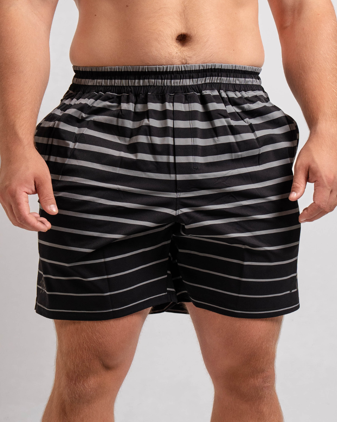 Front view of A7 360Go Shorts in Shadow black, Regular inseam, with wide waistband and minimalist athletic fit.