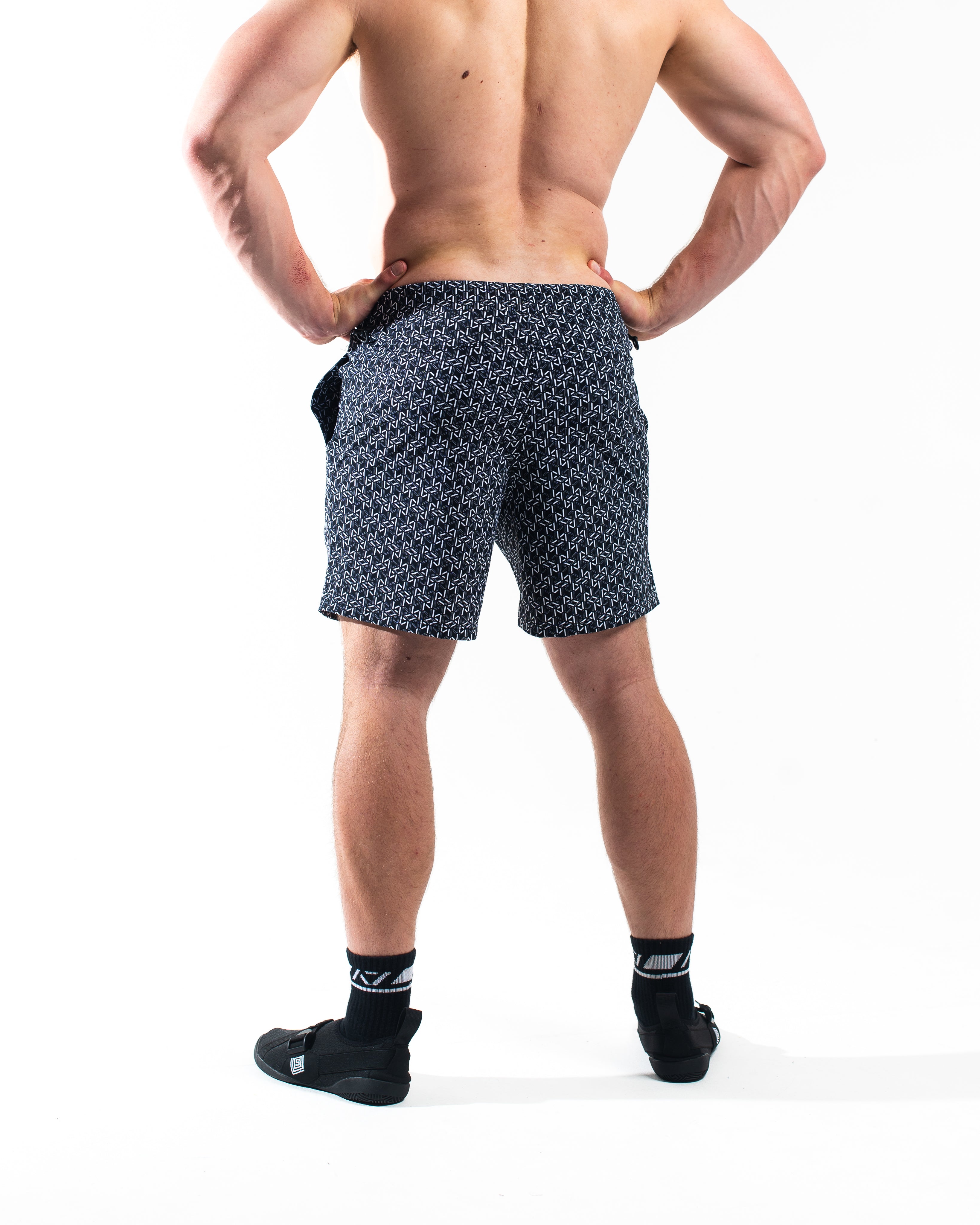 Rear view of A7 360Go Shorts in Stelacrosha Black with ripstop loop-through pockets and athletic performance fit.
