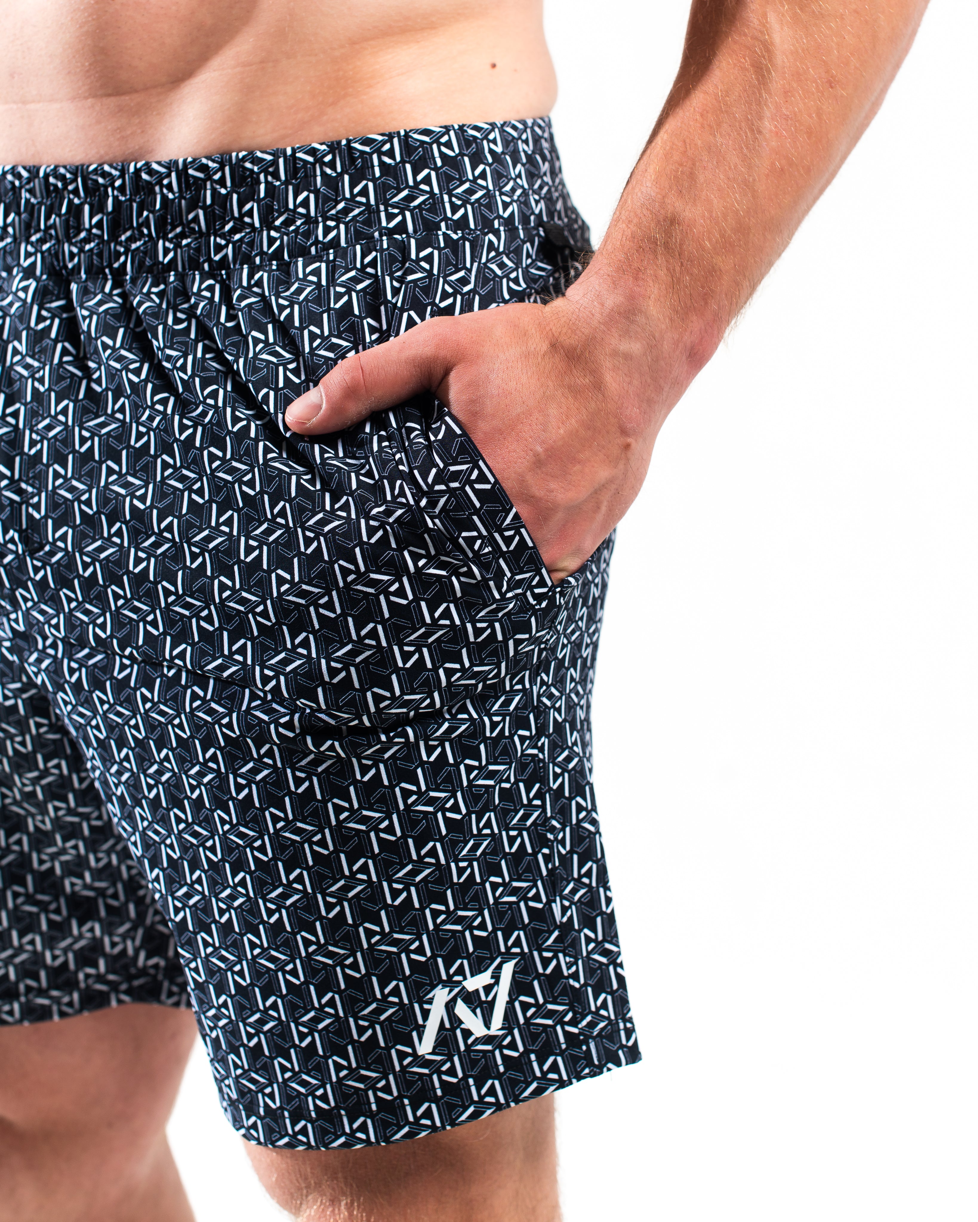 Close-up of ripstop nylon pocket with hidden mini wallet compartment on Stelacrosha Black 360Go Shorts.