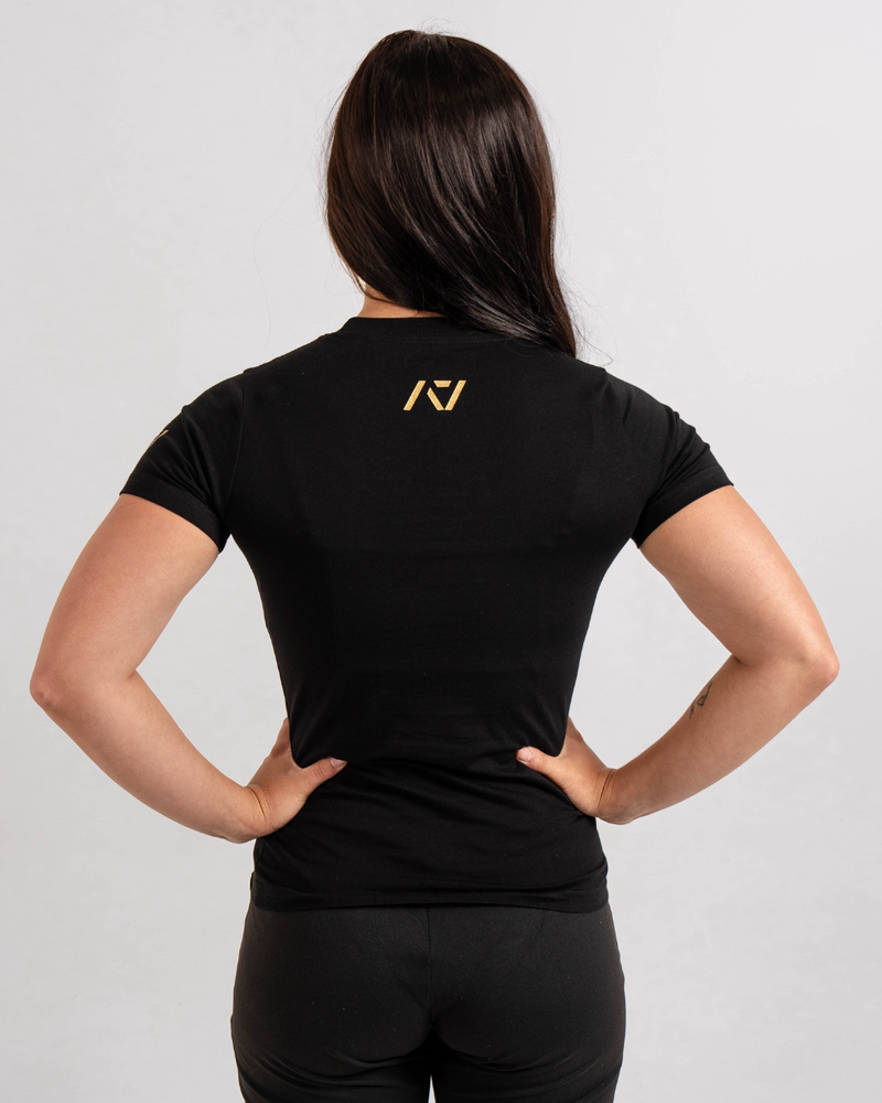 
                  
                    Demand Greatness True-Fit Women's Meet Shirt - Gold Standard
                  
                