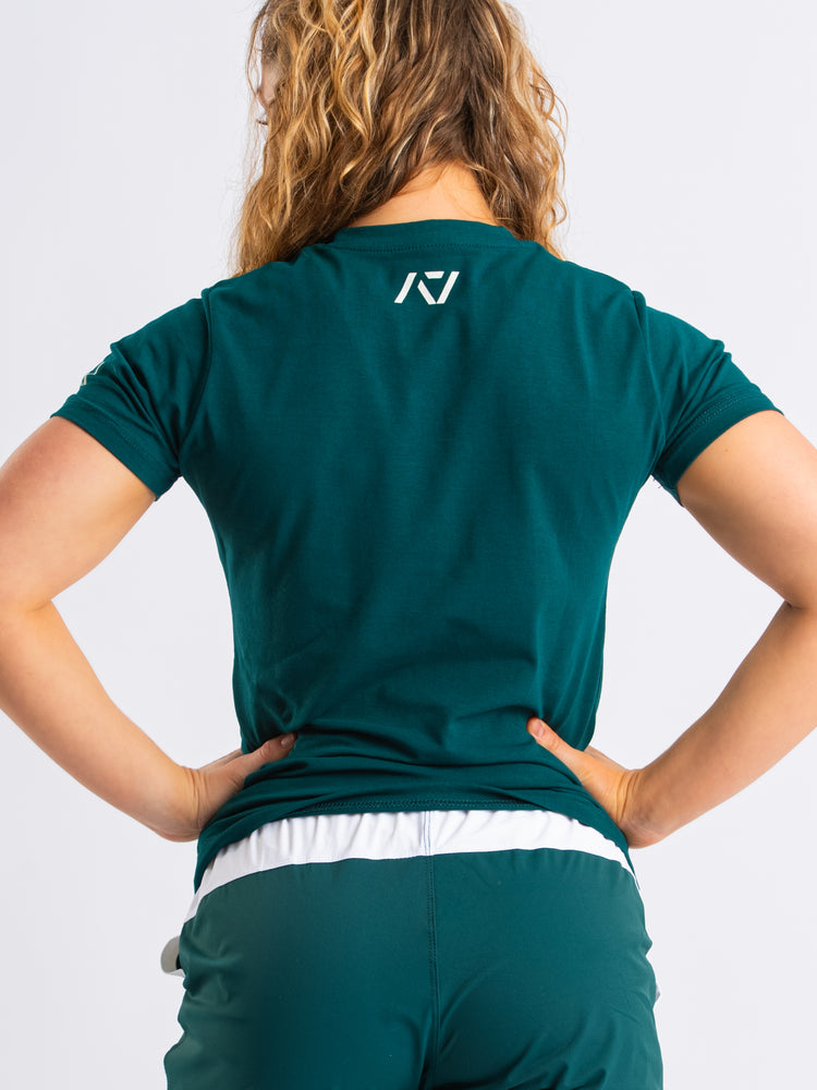 
                  
                    DG23 Women’s Meet Shirt - Emerald Forás
                  
                