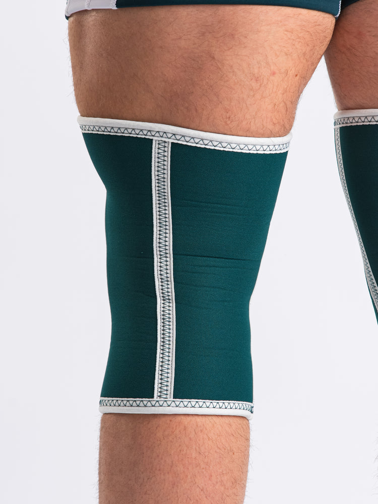 
                  
                    Hourglass Knee Sleeves - Emerald Forás
                  
                