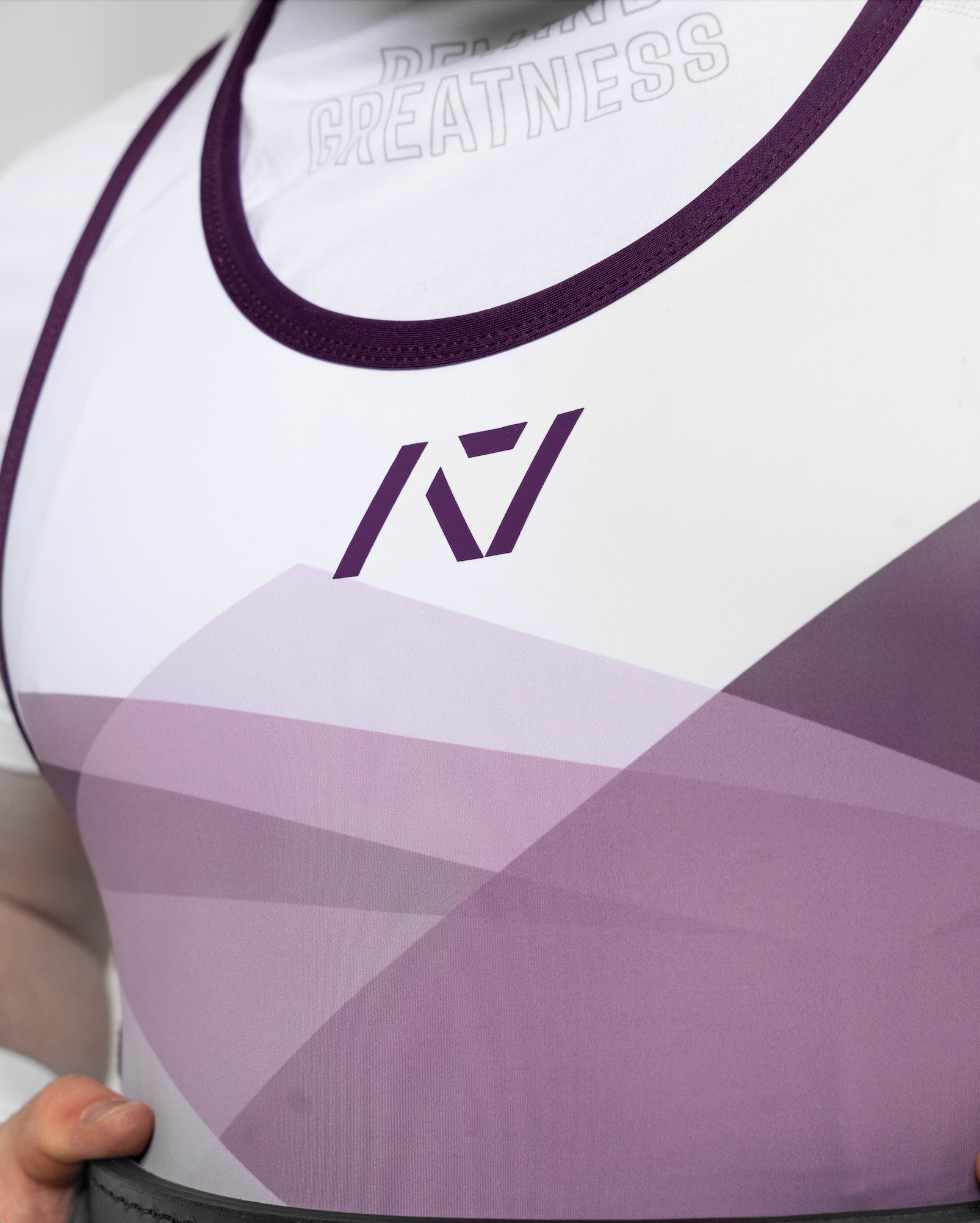Close up of color and pattern on the front of the Rausch Singlet in Lavender on male model