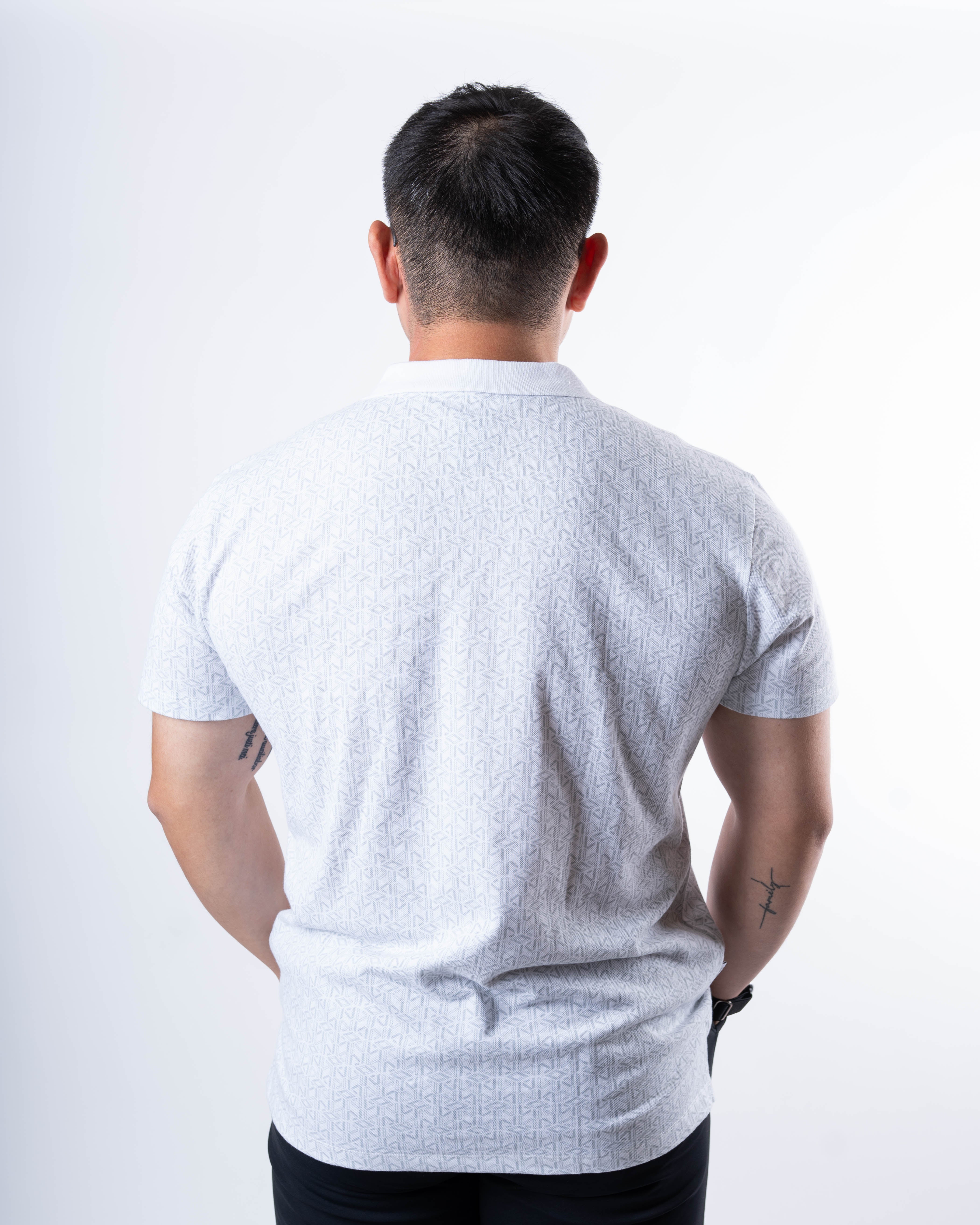 Back view of A7 Cotton Polo in Stelacrosha Gray, highlighting the tennis tail design.