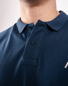 Close-up of the rib-knit polo collar on the A7 Cotton Polo in Tides Blue.