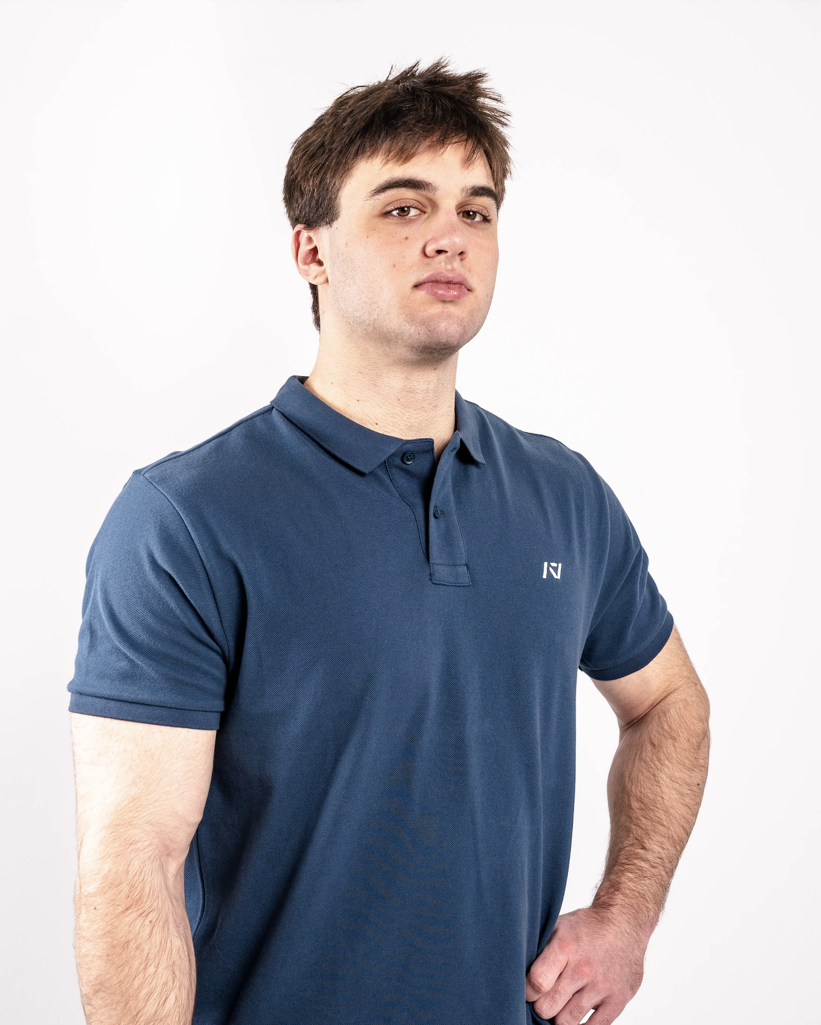 Model wearing the A7 Cotton Polo in Tides Blue, demonstrating fit and style.