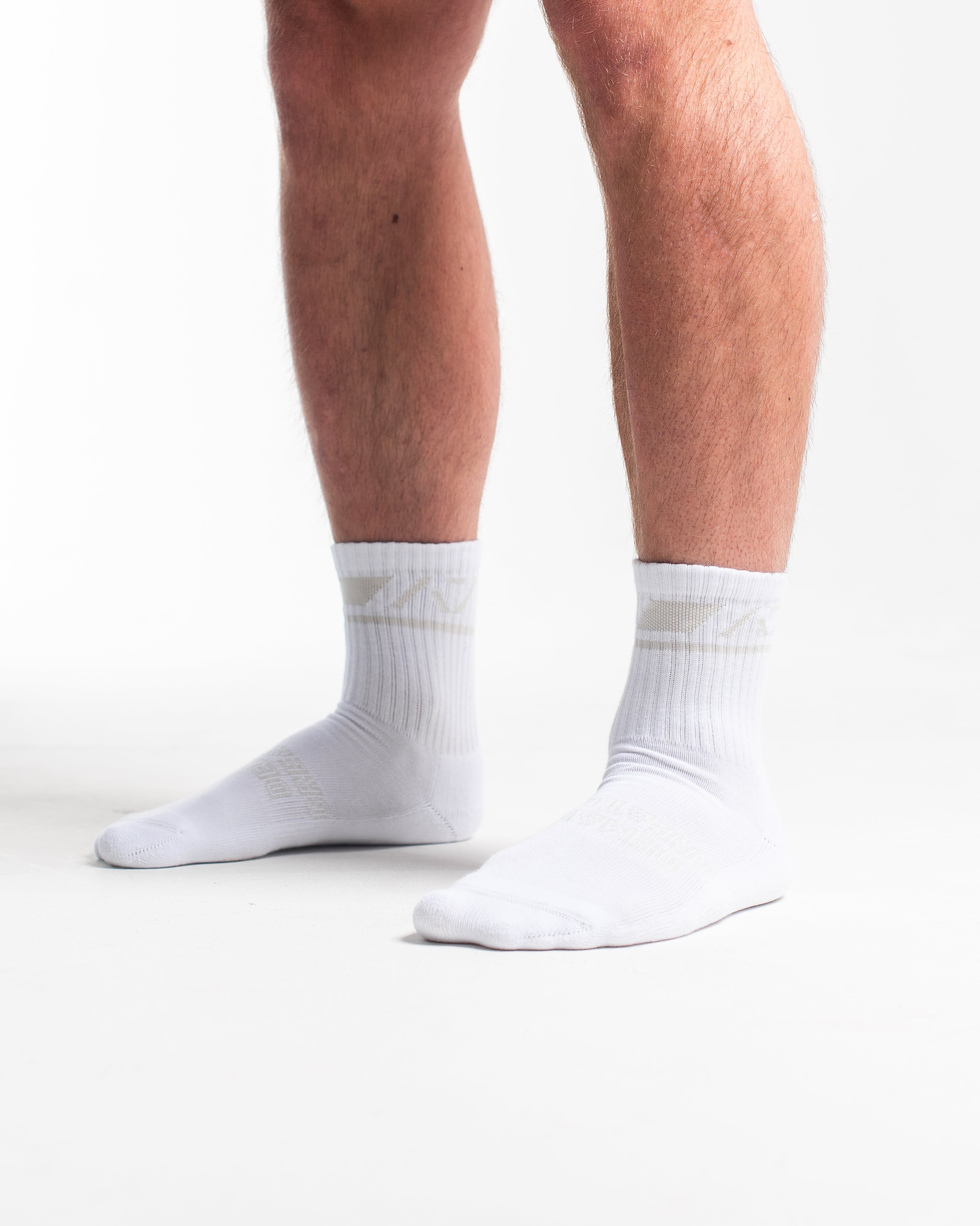Side profile of A7 Crew Socks in Polar, highlighting the A7 logo on the ankle and compression-style top.
