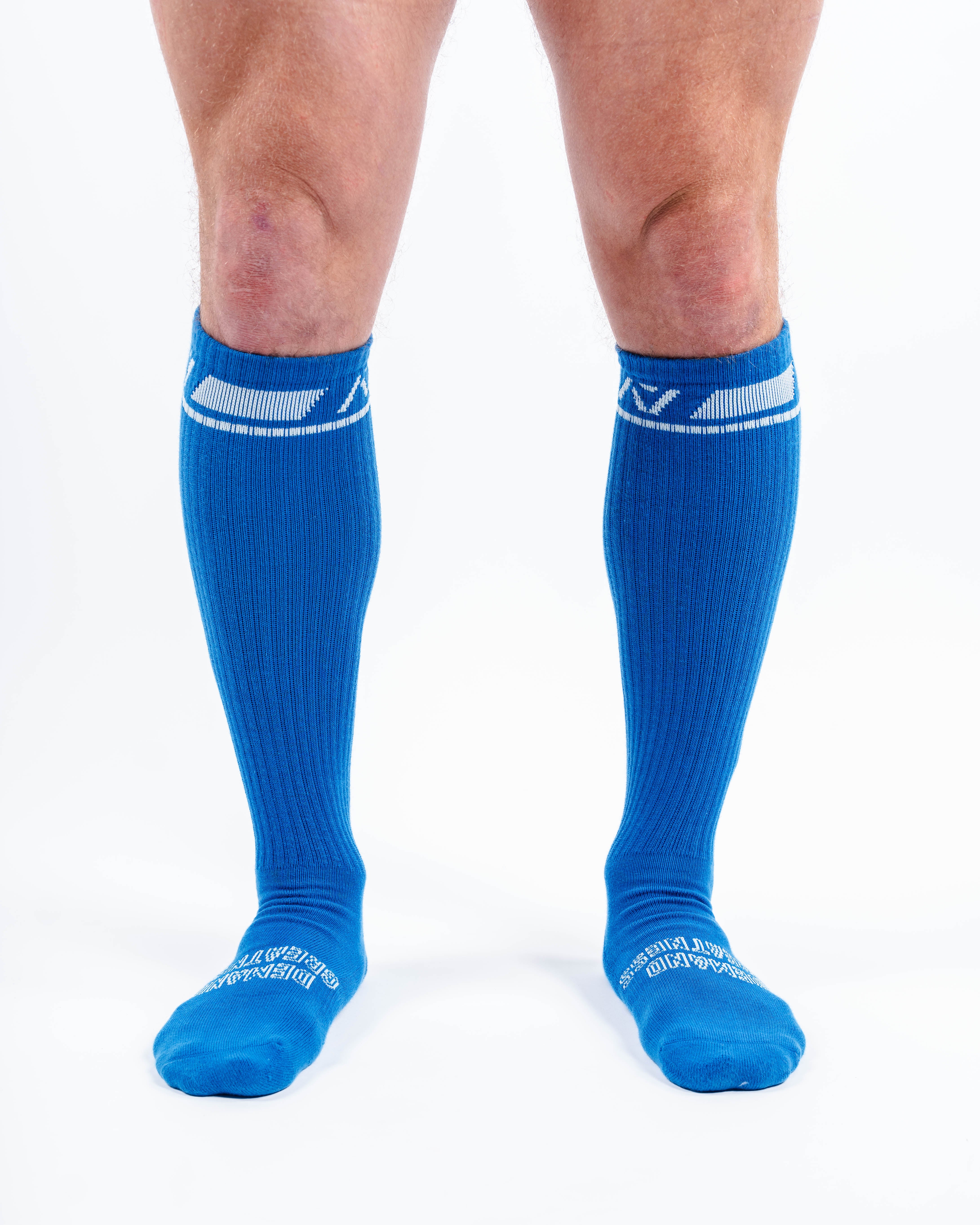 Front view of A7 Deadlift Socks in Cyanite, showcasing mid-shin length and ribbed cuff design.