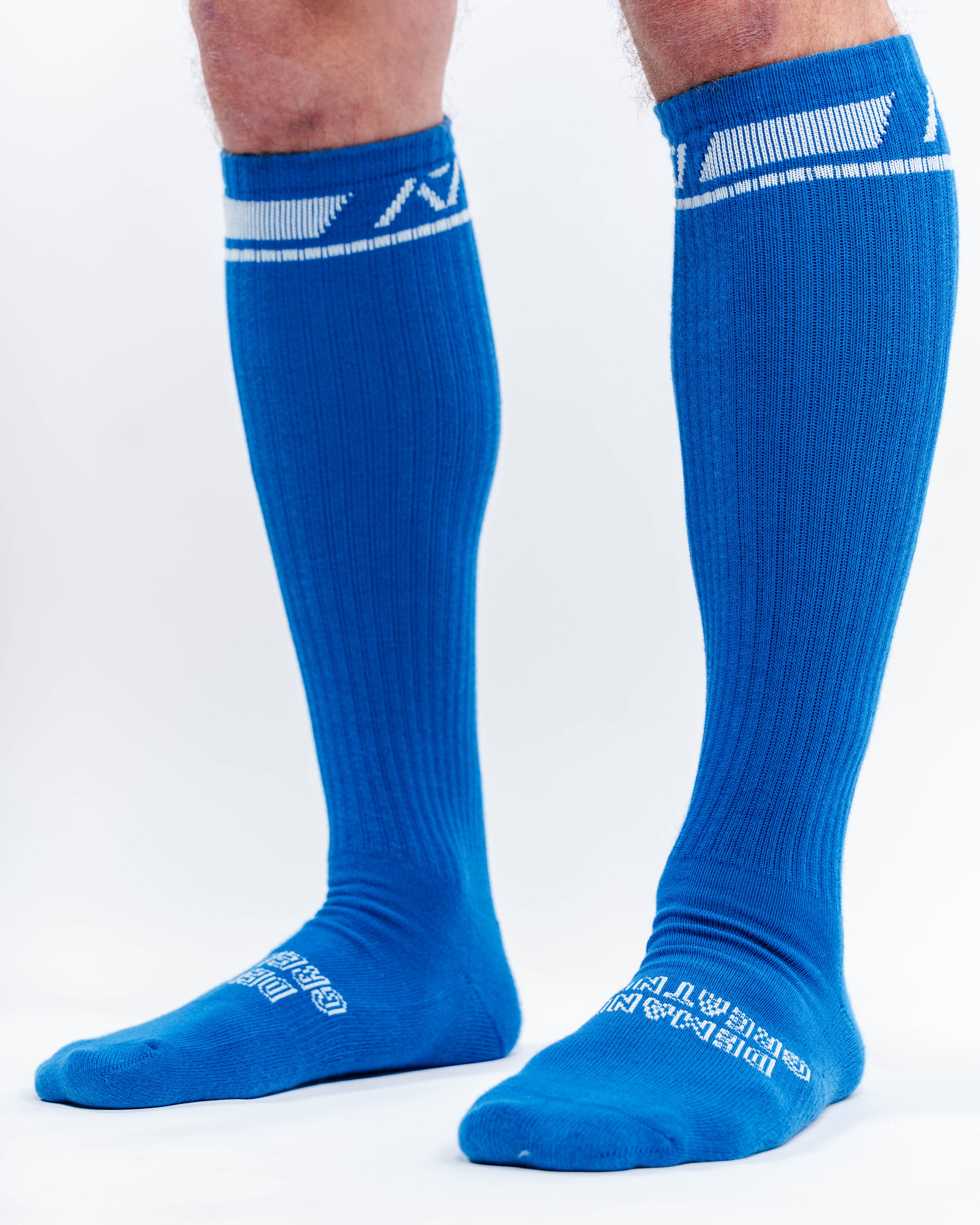 Side profile of A7 Deadlift Socks in Cyanite, highlighting the A7 logo on the ankle and compression-style top.