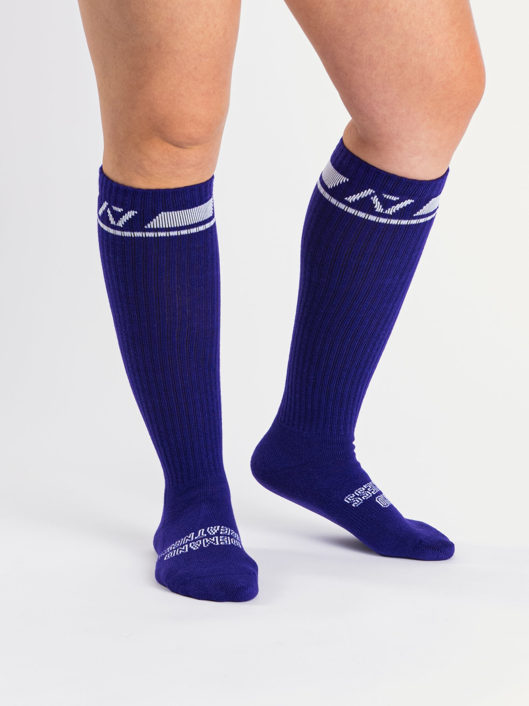 Side profile of A7 Deadlift Socks in purple, highlighting the A7 ankle logo and supportive compression fit.