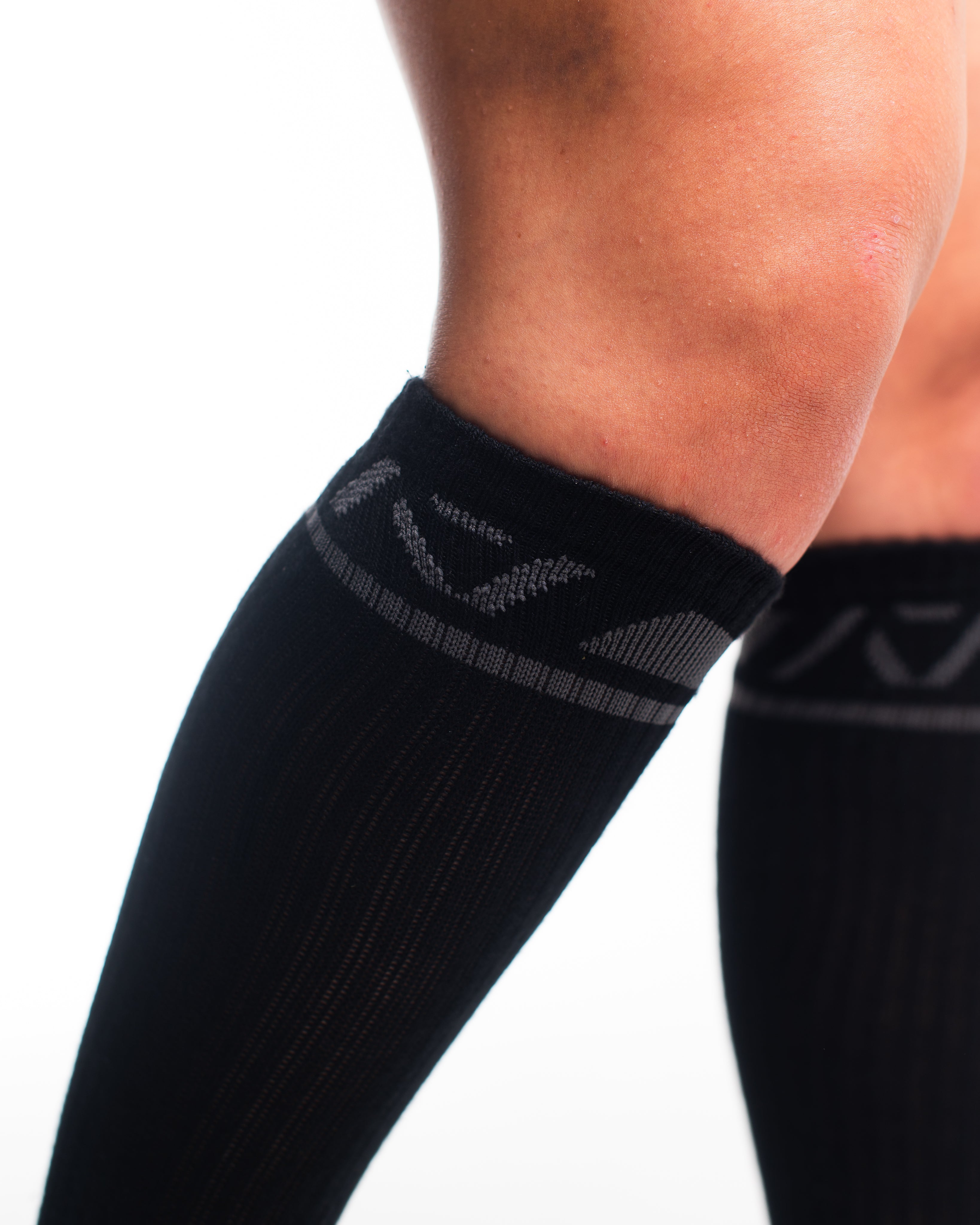 Close-up of knit fabric on Shadow Stone socks, showing stitch detail and high-quality material.