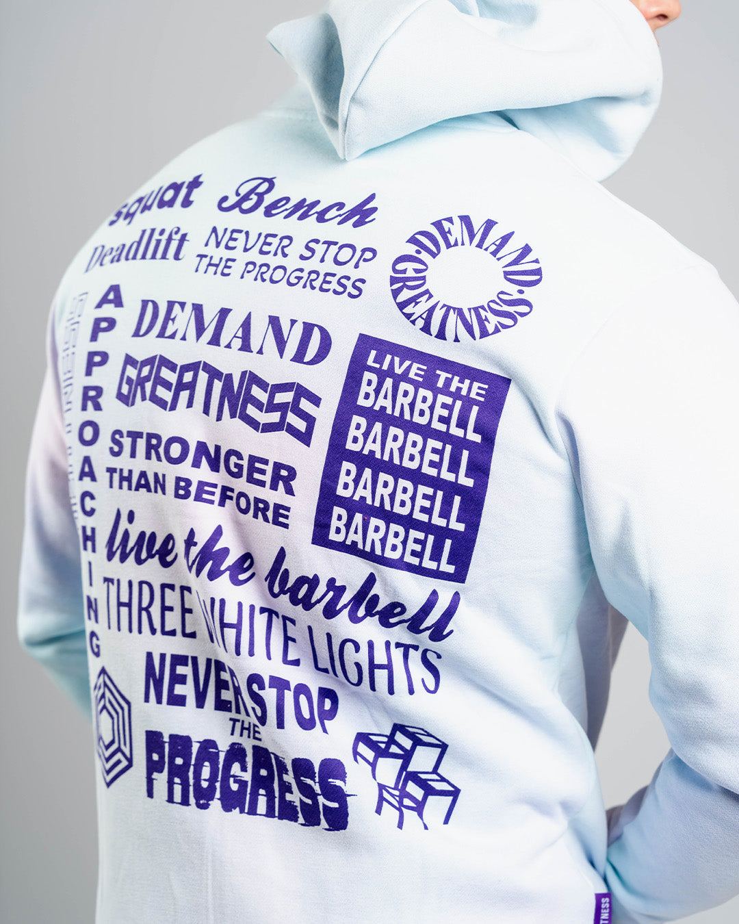 Back view of A7 Affirmation Zip Hoodie – Pastel showcasing motivational mantras in contrasting text on pastel fabric.