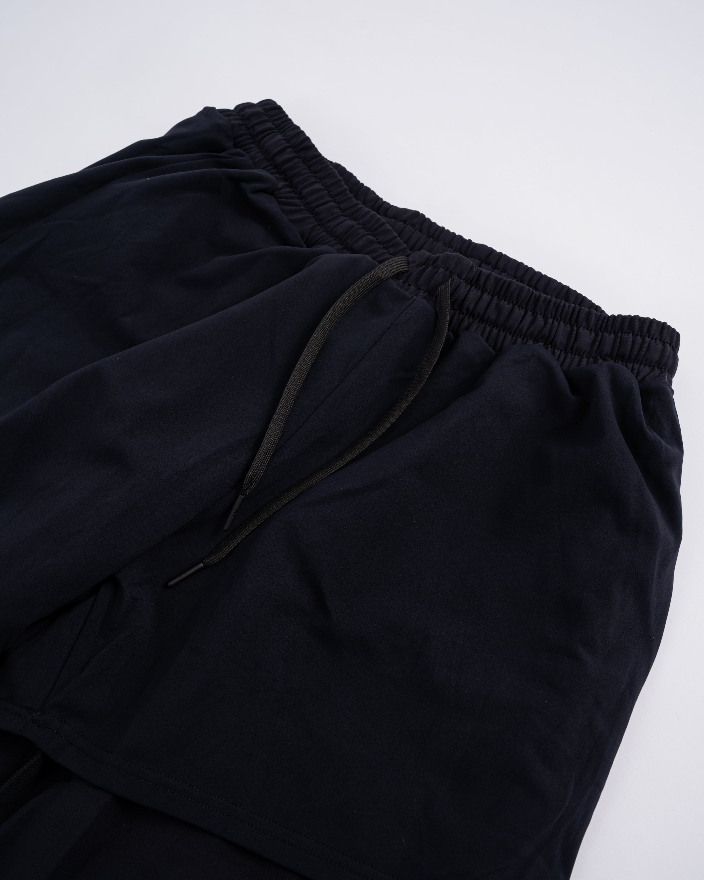 Detail of the hidden drawstrings with A7 aglets on the Cobra 360Go 1Z Joggers in Stealth.