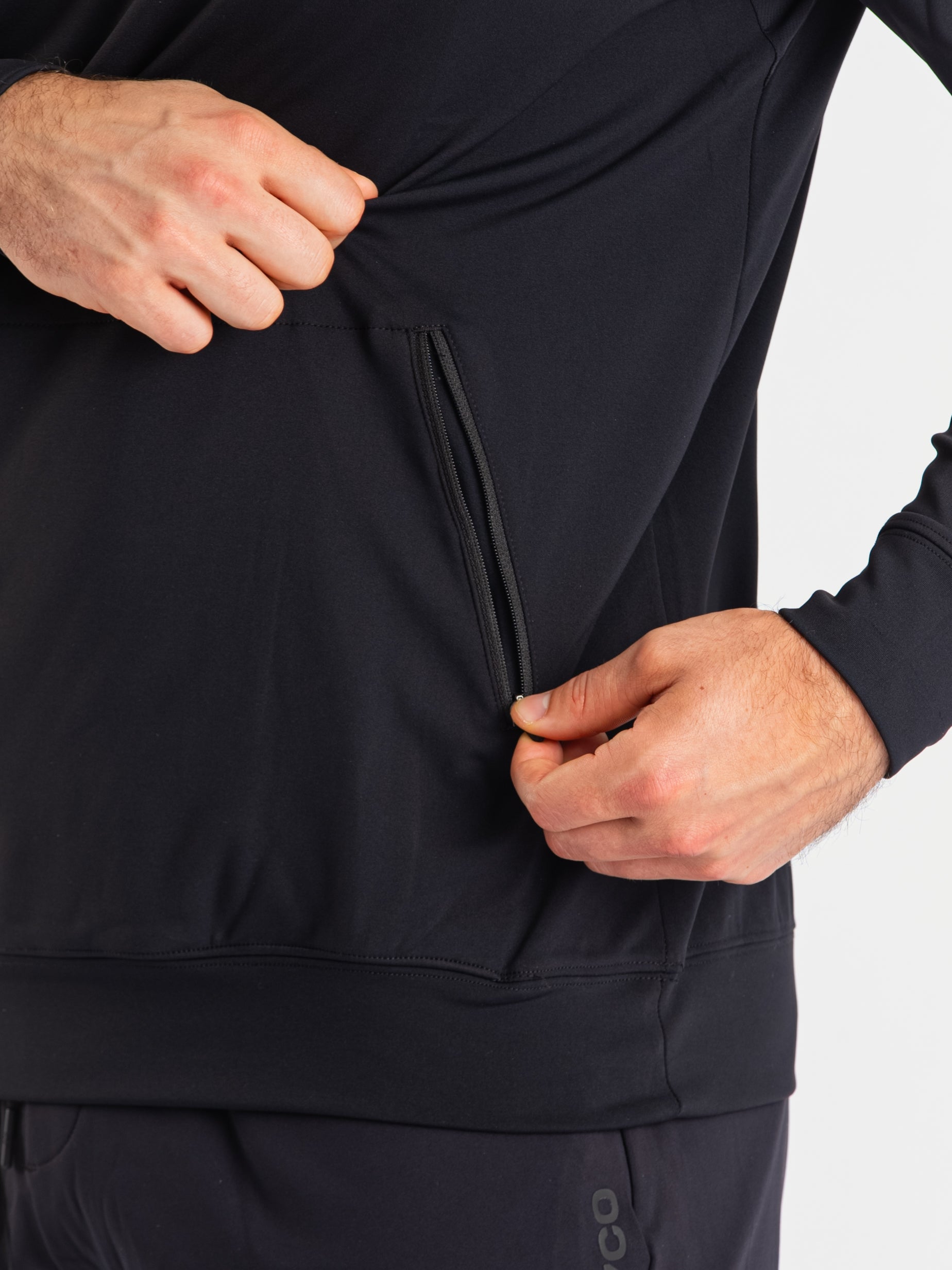 Close-up of the zippered pocket on the A7 Cobra Quarter Zip Jacket – Stealth, designed for secure storage with a clean, minimalist finish.