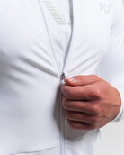 Close-up of YKK front zipper and collar detailing on the Polar Defy Jacket.
