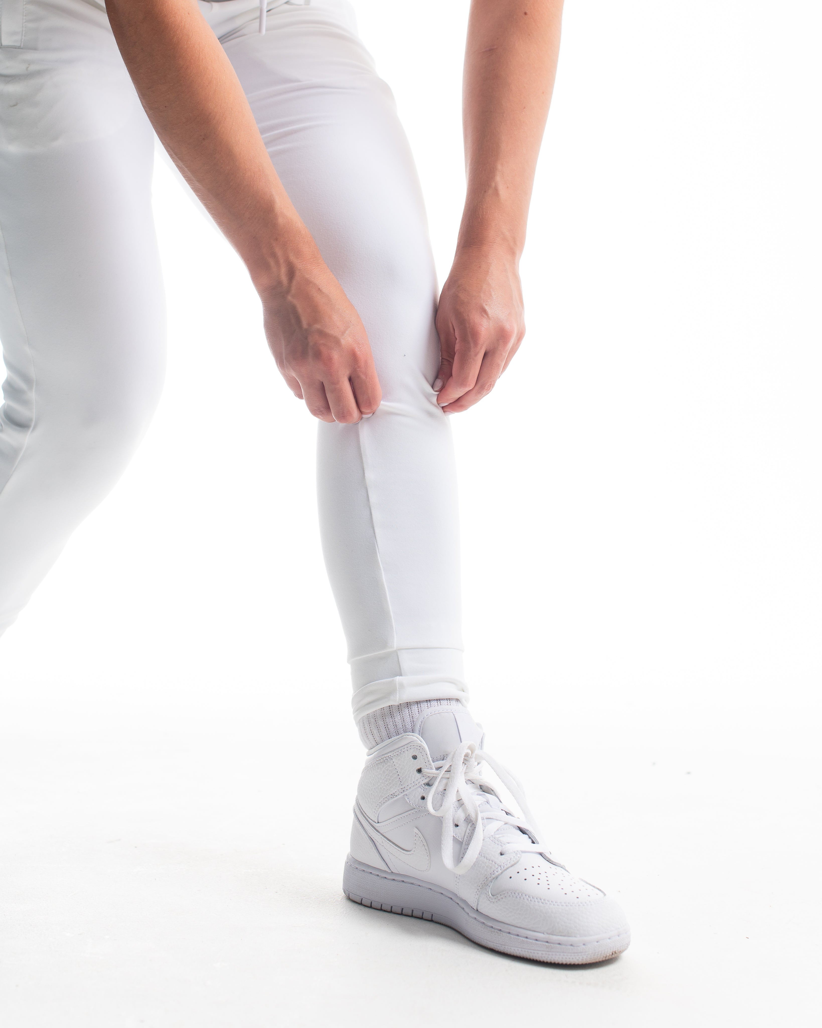 Close-up of elastic ankle cuff on Polar Defy Joggers locking fabric neatly at the ankle.