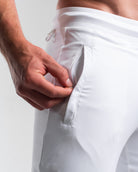 Close-up of zippered front pocket on Polar Defy Joggers with fabric-integrated zipper pull.
