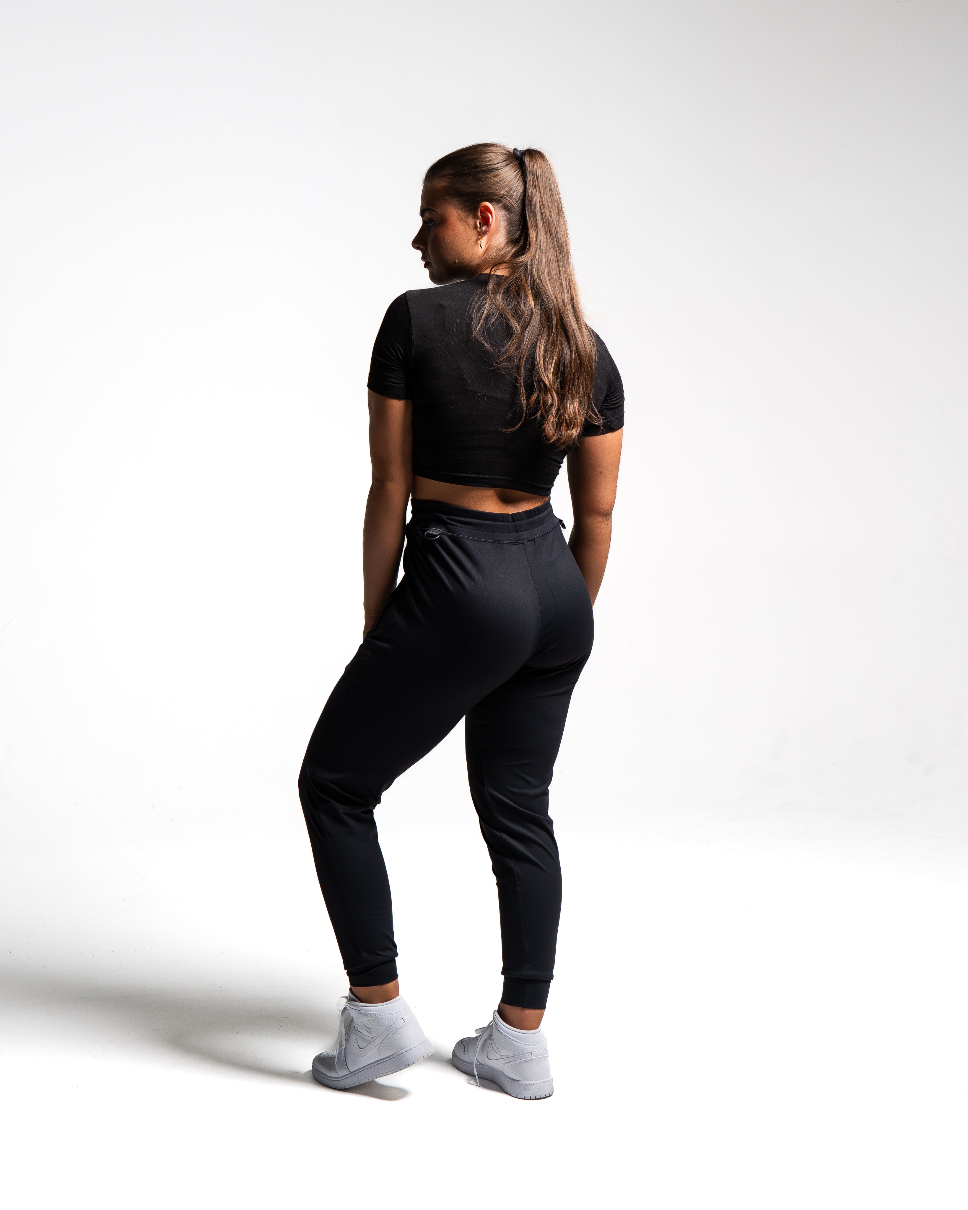 Rear view of the USAPL Classic joggers showing clean silhouette with no back pockets.