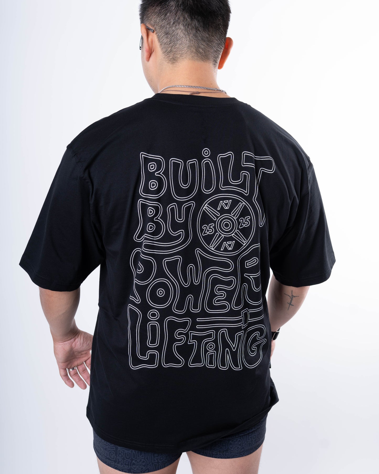 
                  
                    Built By Over-Fit Unisex Shirt - Black
                  
                