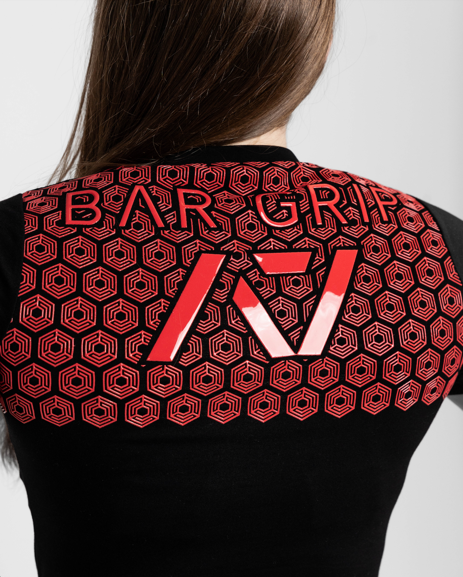 Close up of bar grip on fire bar grip womens shirt