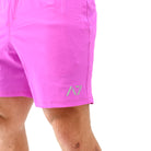 Matte silicone A7 logos on Orchid 360Go Shorts for subtle, long-lasting branding on a bold lavender color.