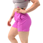 Side profile of Orchid 360Go Shorts showing extended inseam and flexible stretch fabric for unrestricted movement.