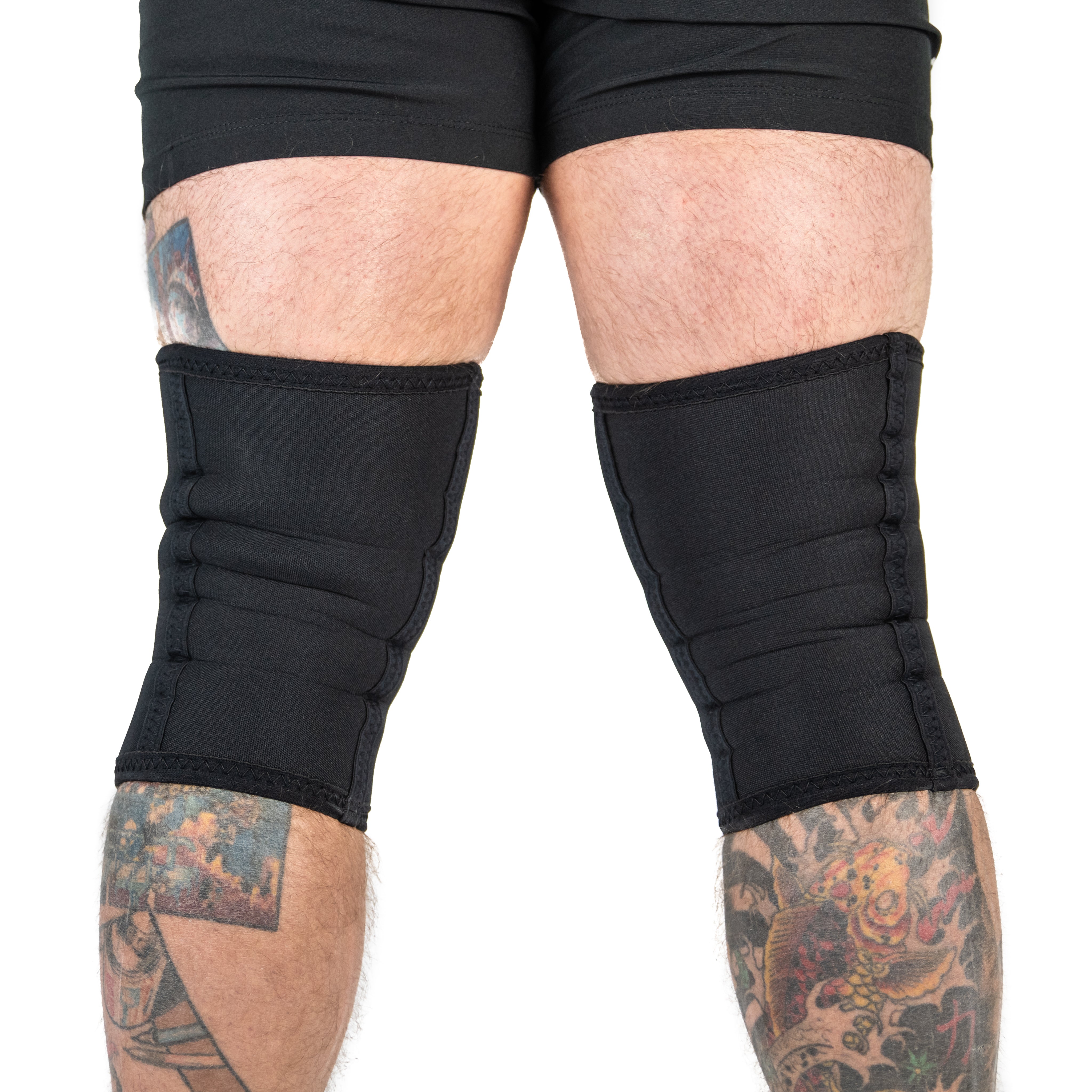 Back view of A7 Stealth Stiff CONE Knee Sleeves on lifers knees.